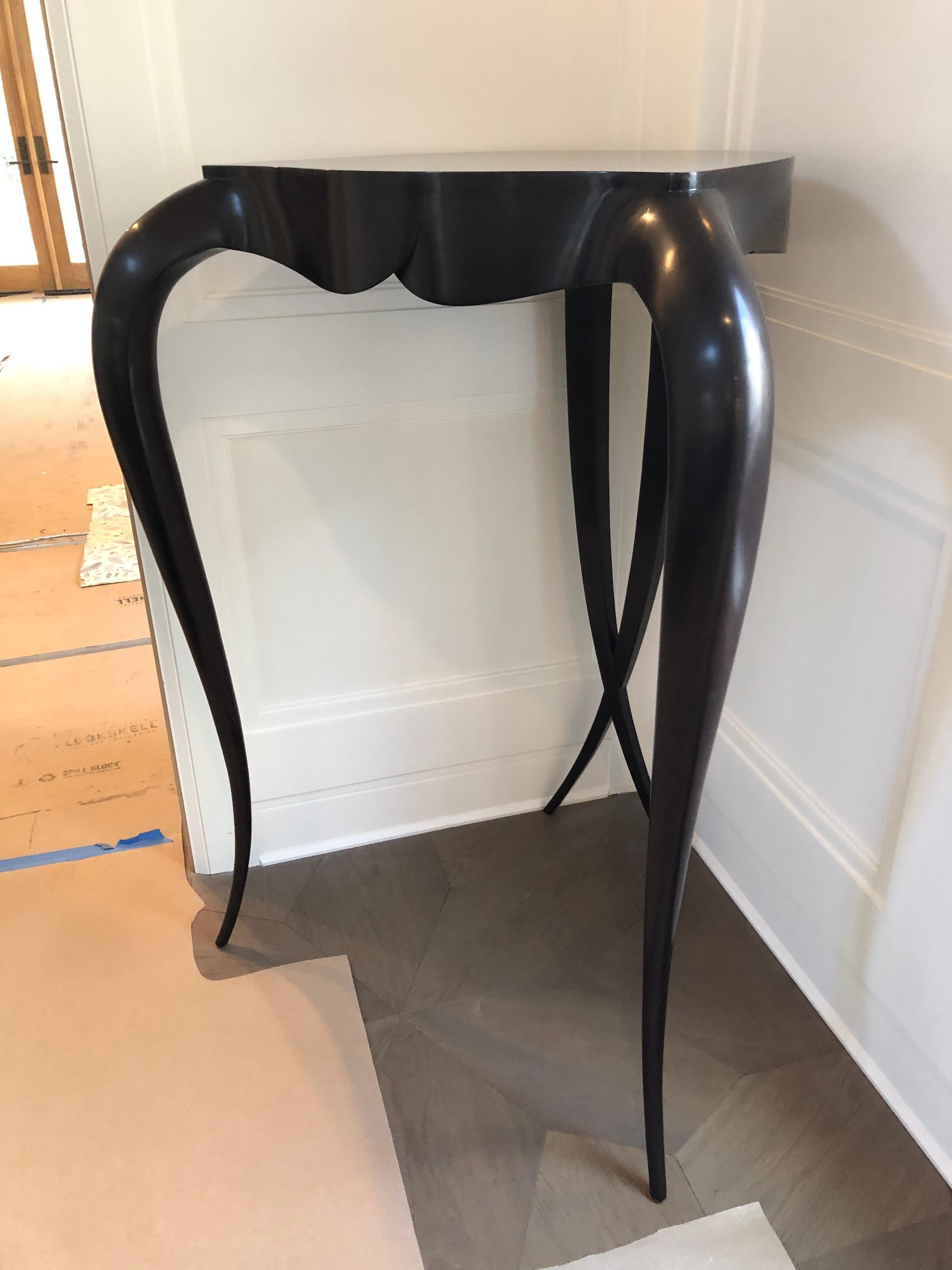Sophisticated sensual glossy dark mahogany very tall curvaceous console pedestal, an eye catching perch for an objet d'arte or flower arrangement on sinuous cabriole legs having the signature Christopher Guy criss cross tapered elegant legs in the