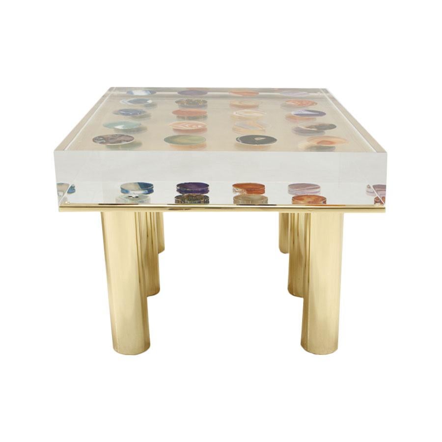 Side table designed and produced by Studio Superego. Made of plexiglass of ten centimeters thickness, with agates inlaid and legs in brass. Made in Italy.

The project Superego was born in 2003 within Movimento Moderno, a company working in design,