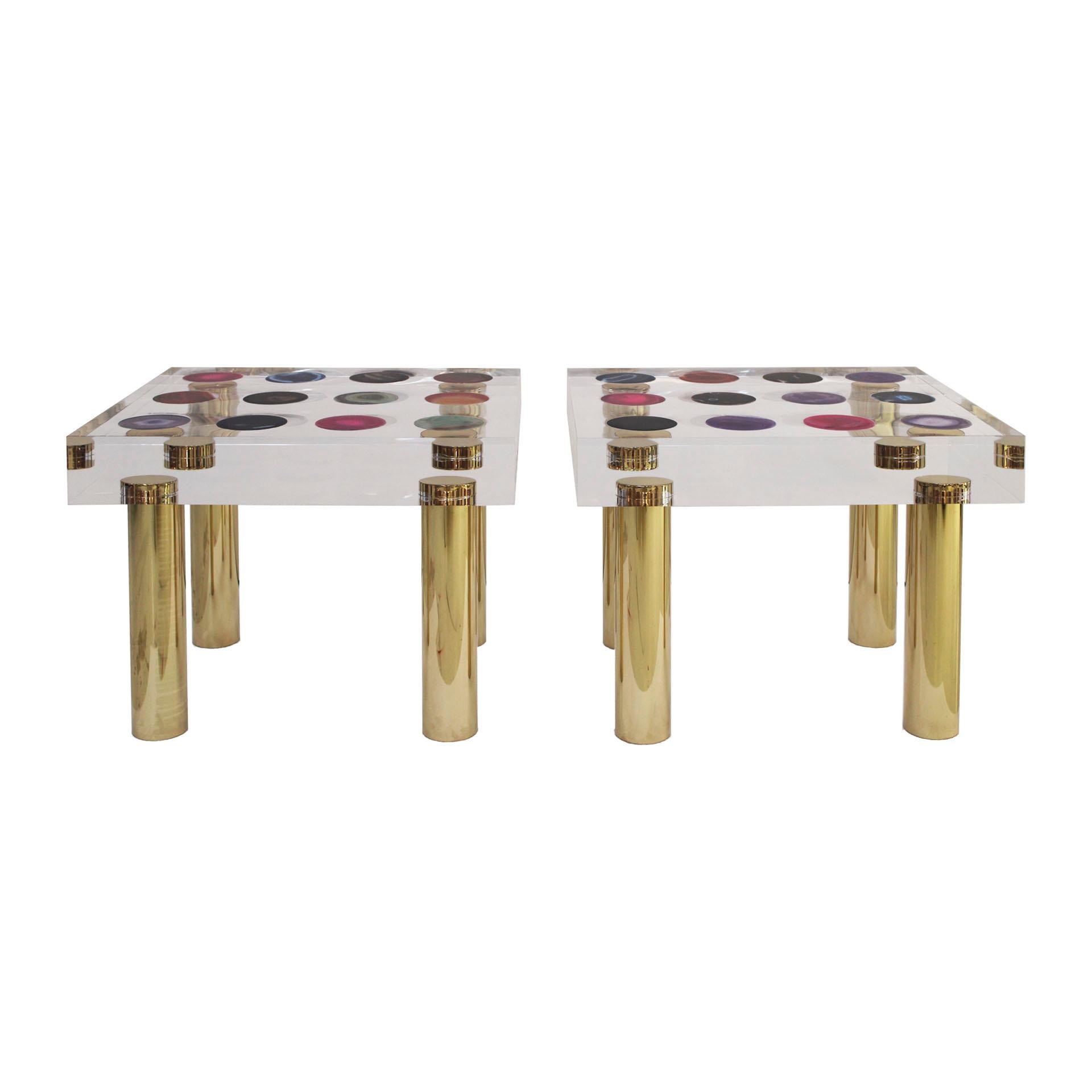 Side tables designed and produced by Studio Superego. Made of plexiglass of ten centimeters thickness, with agates inlaid and legs in brass. Made in Italy.

The project Superego was born in 2003 within Movimento Moderno, a company working in design,