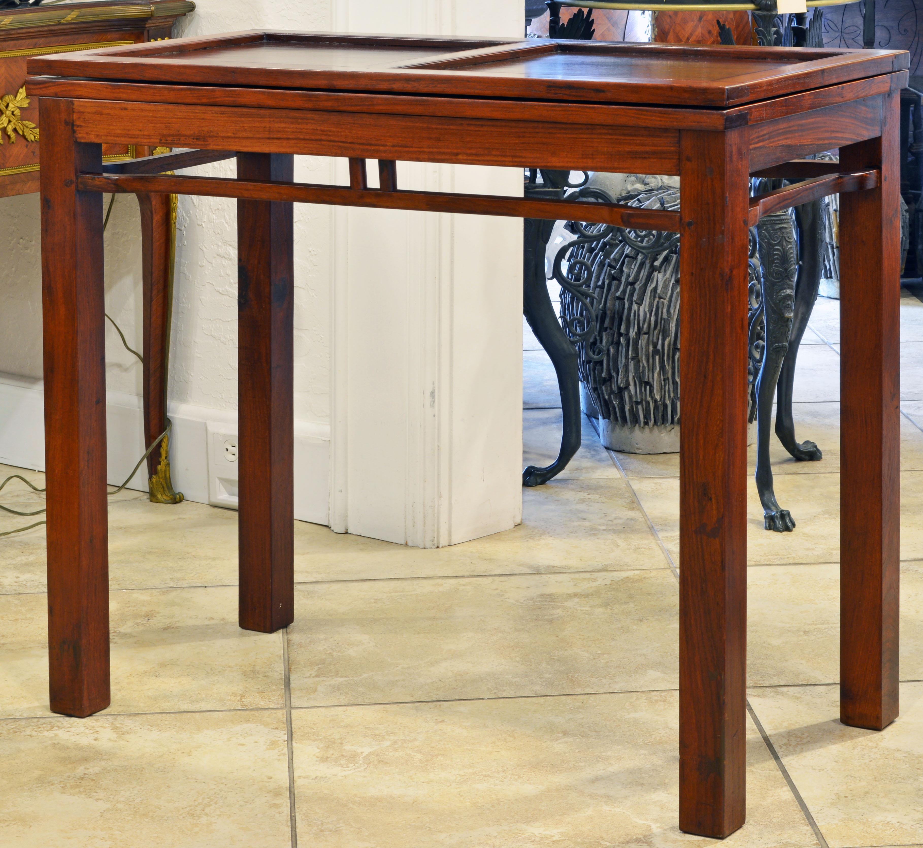 Fashioned in the classical Ming style with corner legs, small frieze and humpback stretchers these game table is a more modern elegant translation of the old Chinese tradition. Great craftsmanship in construction as well as in the four delicate