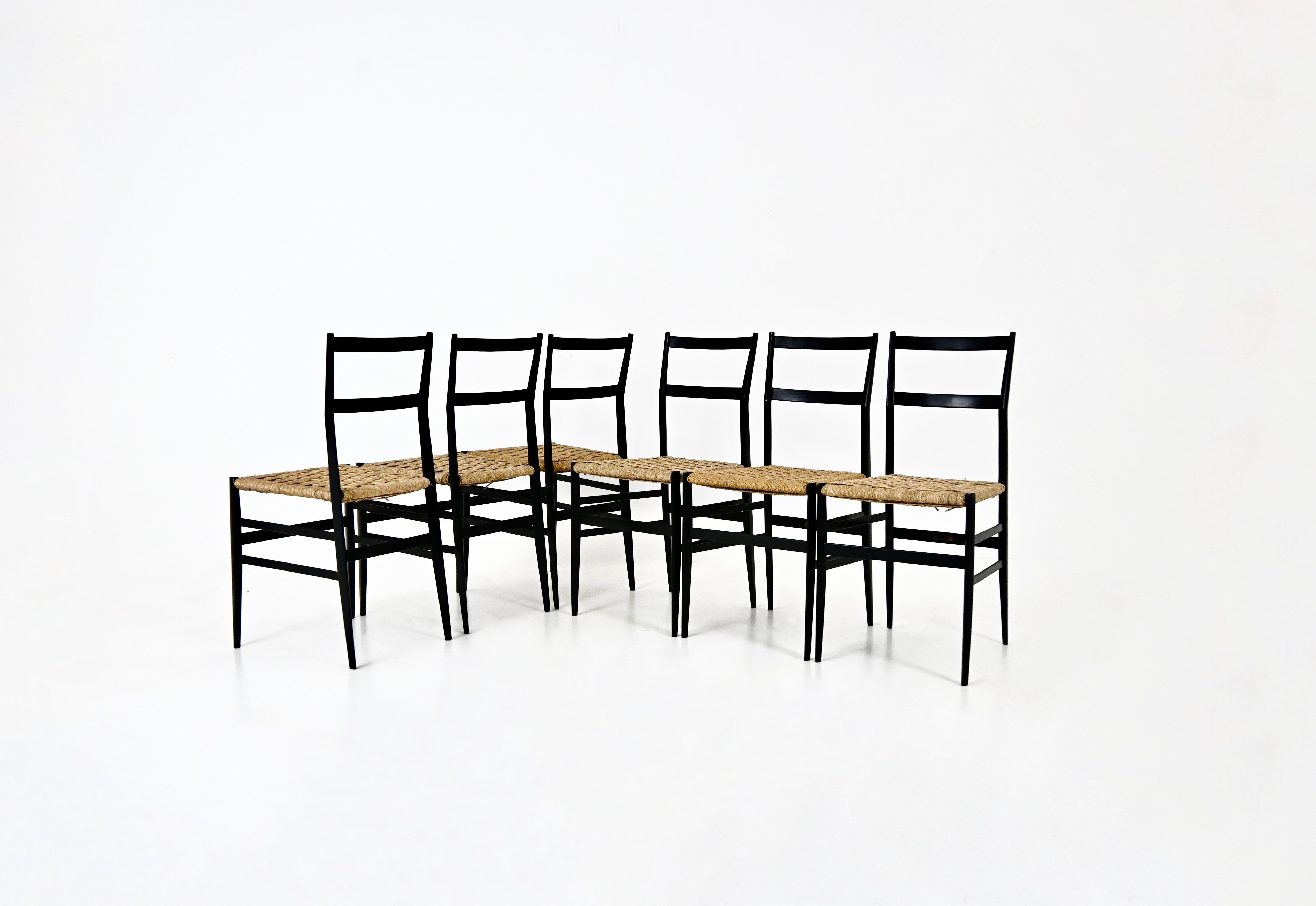 Set of 6 black wood and wicker chairs designed by Gio Ponti for Cassina. Stamped Cassina. Seat height 46cm. Wear due to time and age.
FOR SHIPPING, REQUEST US FOR RECEIVE THE BEST PRICE
