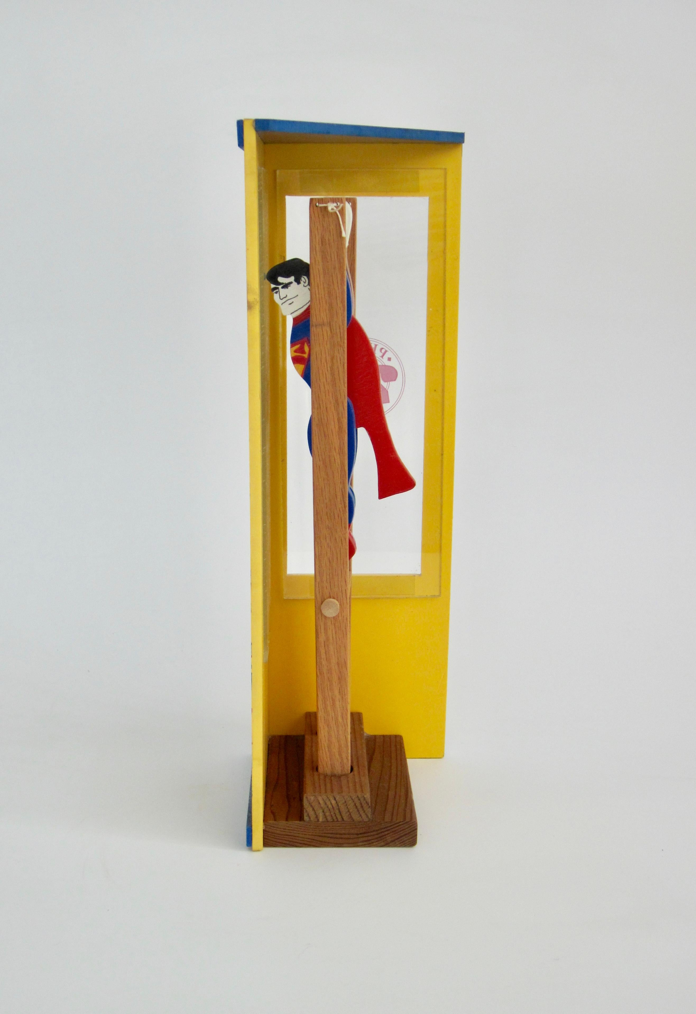 Superman/Clark Kent Wooden Trapeze Artist Toy with Graffiti Phone Booth For Sale 2