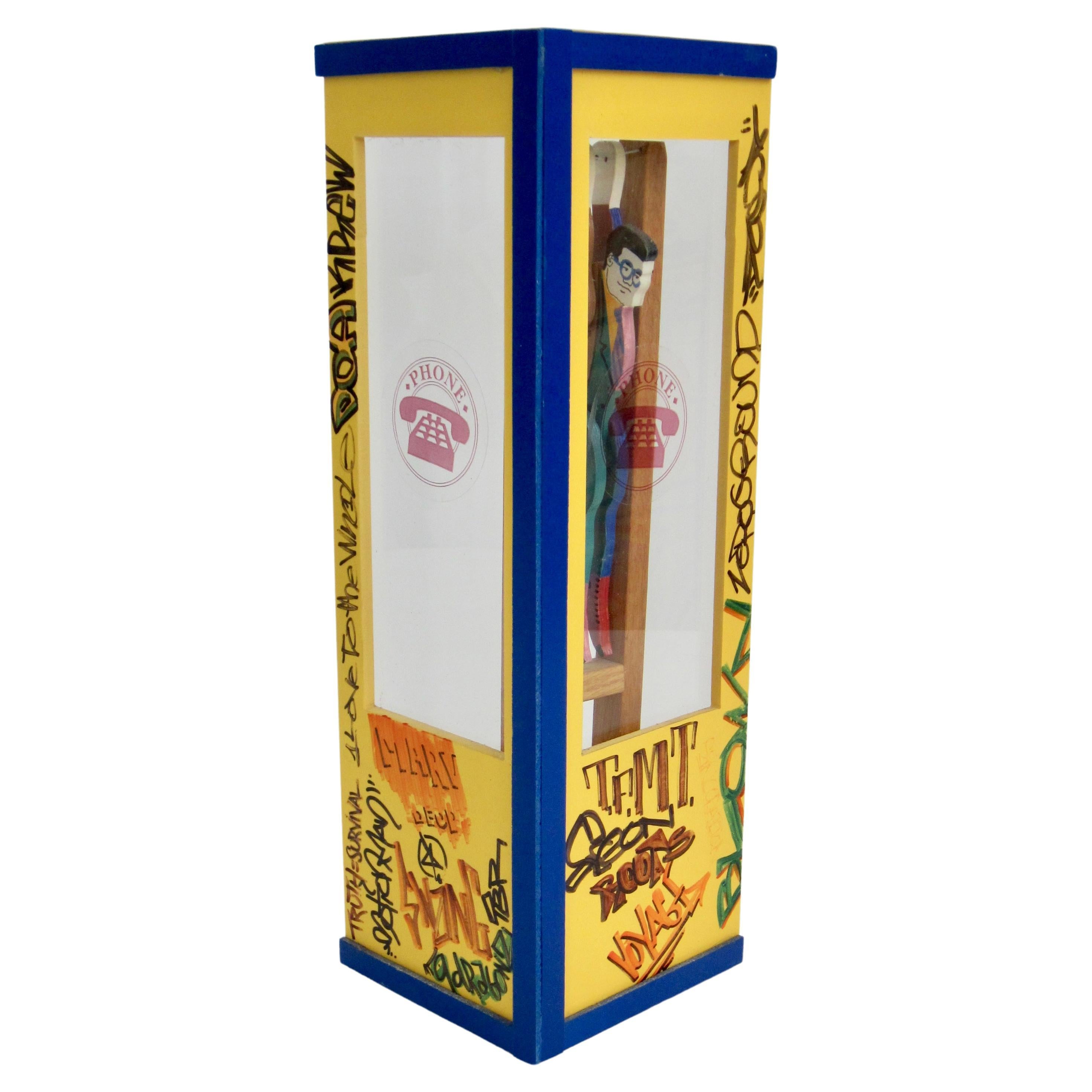 Superman/Clark Kent Wooden Trapeze Artist Toy with Graffiti Phone Booth For Sale