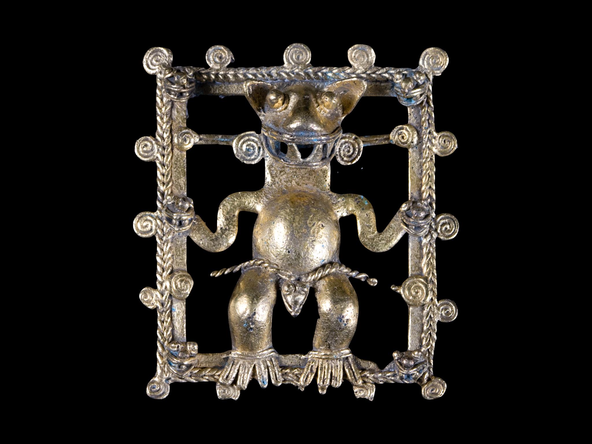 Southern Costa Rica or Western Panama, circa 800 to 1500 AD. A very fine example of the goldwork of the Veraguas-Chiriqui-Diquis region. A pendant in Carbonera style of a supernatural being, a composite monster with human torso and feline (probably