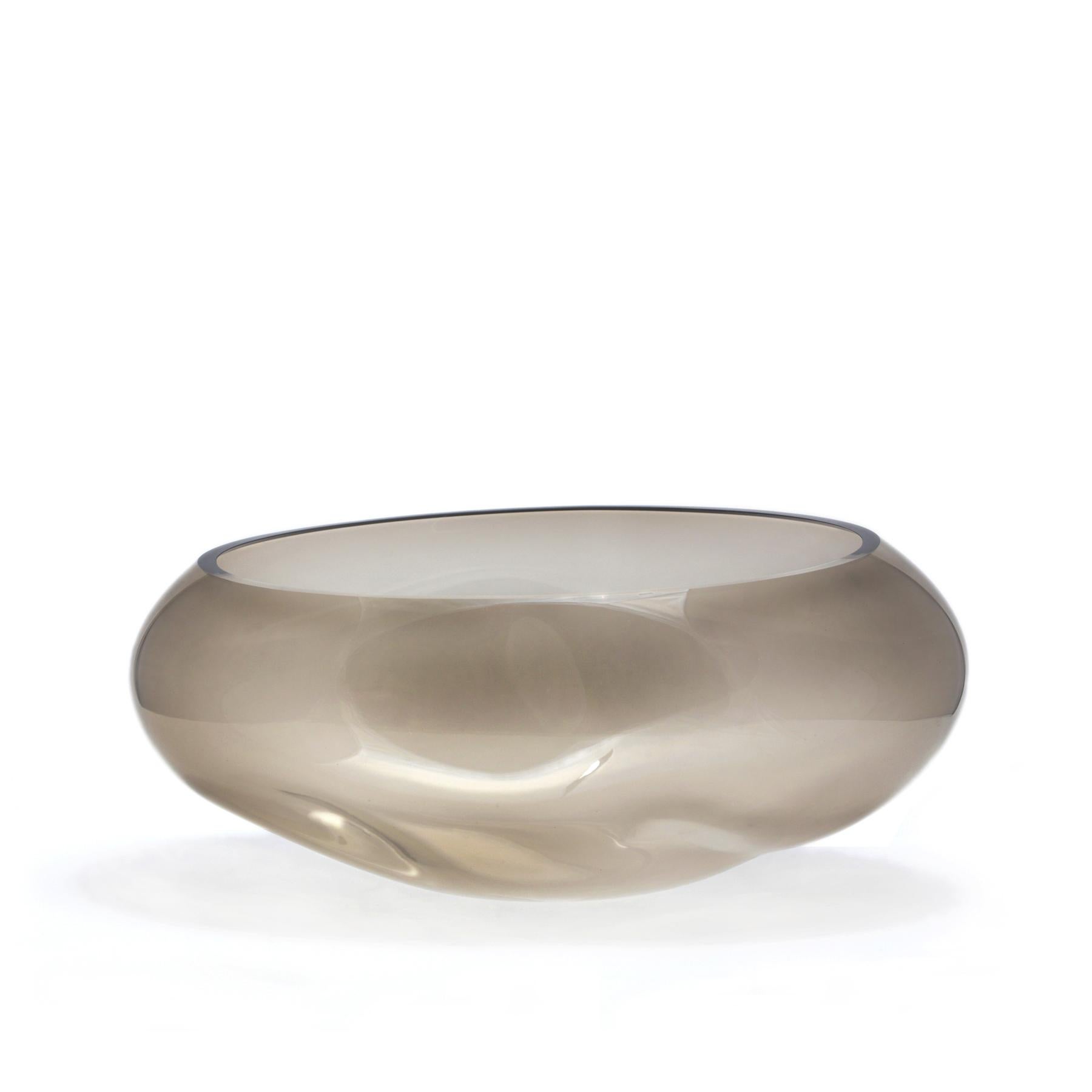 Supernova I silver smoke M bowl + vase by ELOA
No UL listed 
Material: glass
Dimensions: D24 x W37 x H17 cm
Also available in different colours and dimensions.

SUPERNOVA is a rare and magical visual phenomenon that manifests itself as a quick