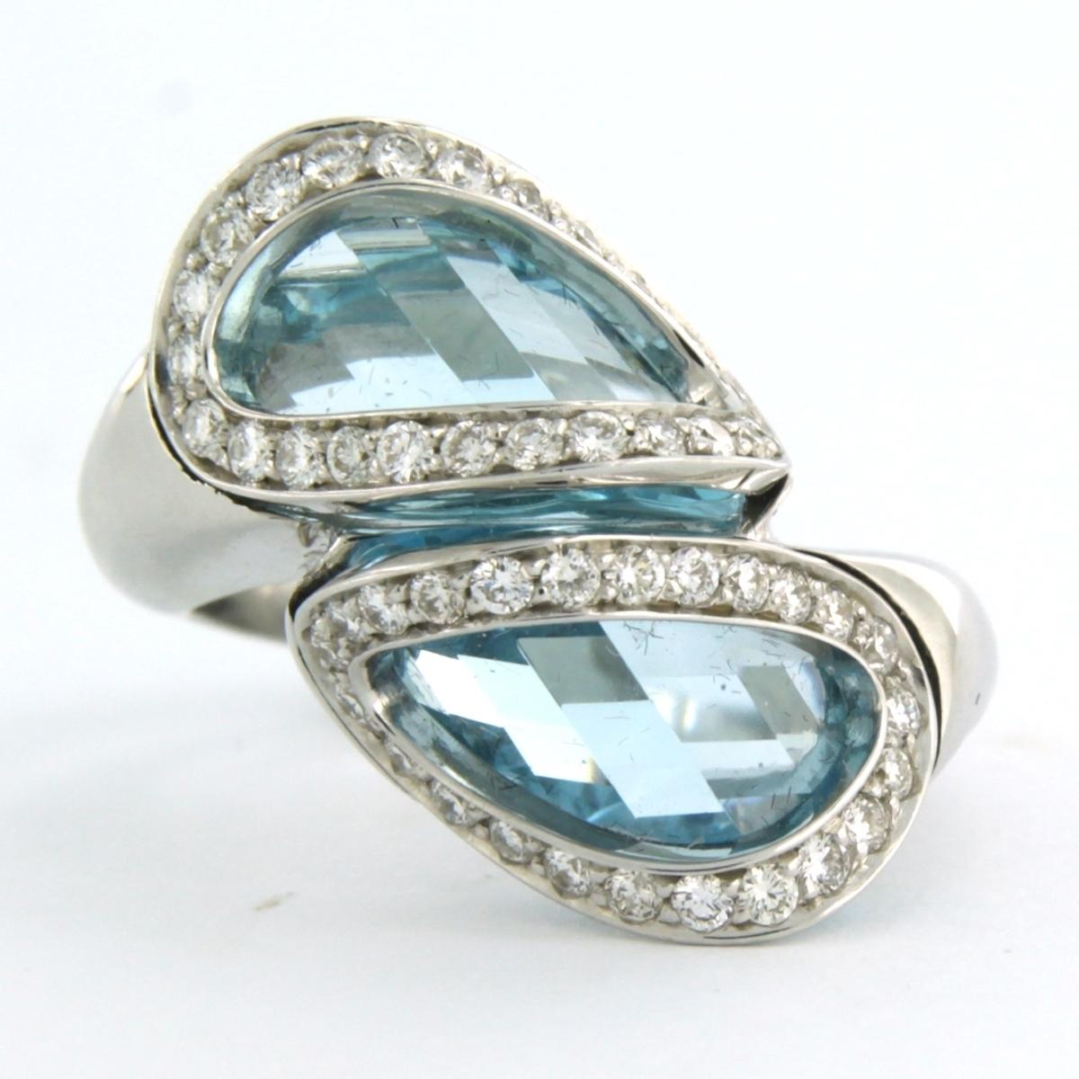 SUPERORO 18 kt white gold ring set with topaz 6.00 ct and brilliant cut diamond up to. 0.58 ct - F/G - VS/SI - ring size U.S. 6.5 - EU. 17(53)

detailed description:

The top of the ring is 2.2 cm wide by 1.0 cm high

weight 11.9 grams

ring