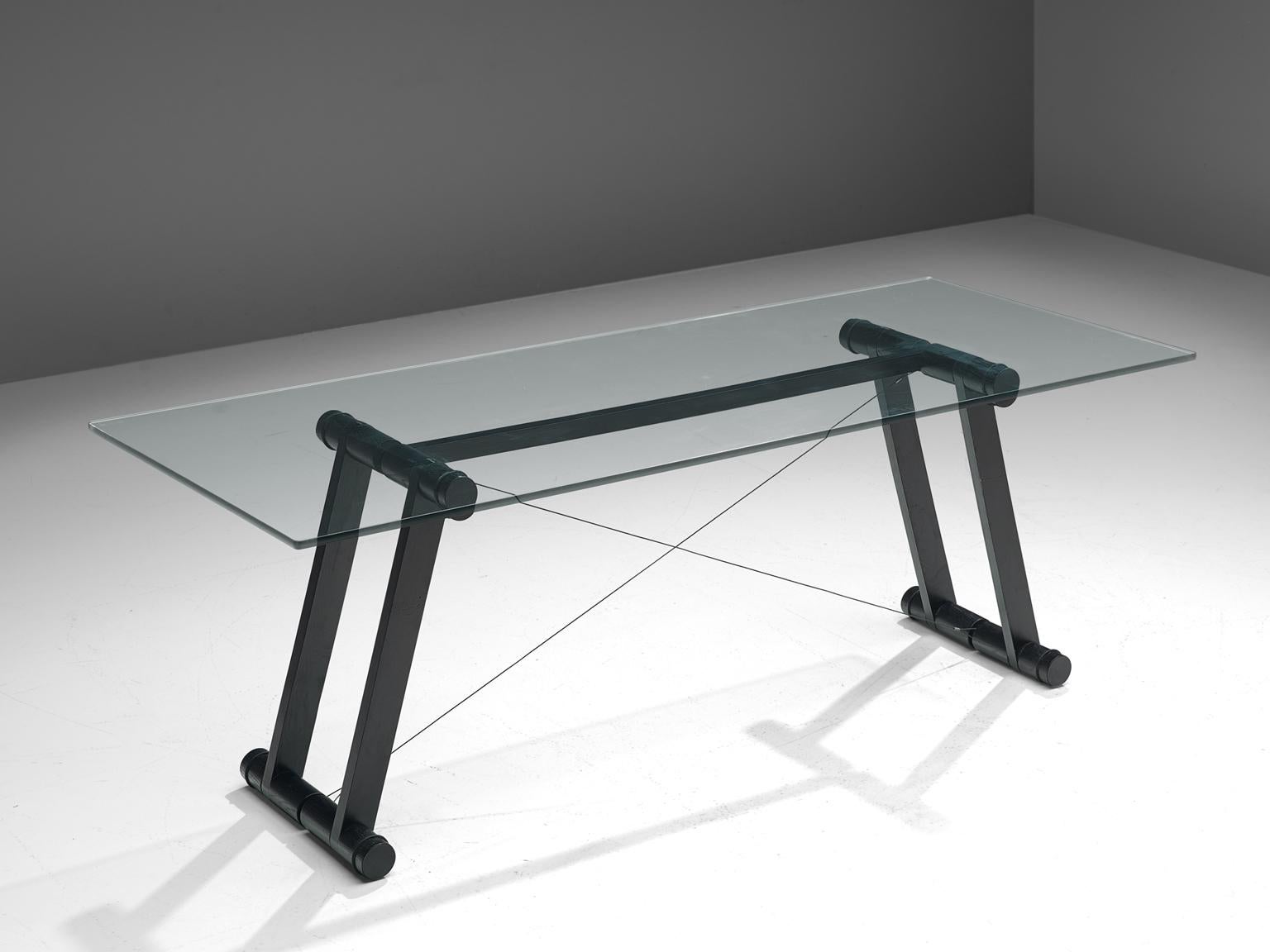 Superstudio, dining table, in black metal lacquered and glass, Italy 1970s. 

Exceptional table by the Italian architects of Superstudio. The rectangular work table has a clear glass top. The frame consist of four large tubular legs of black