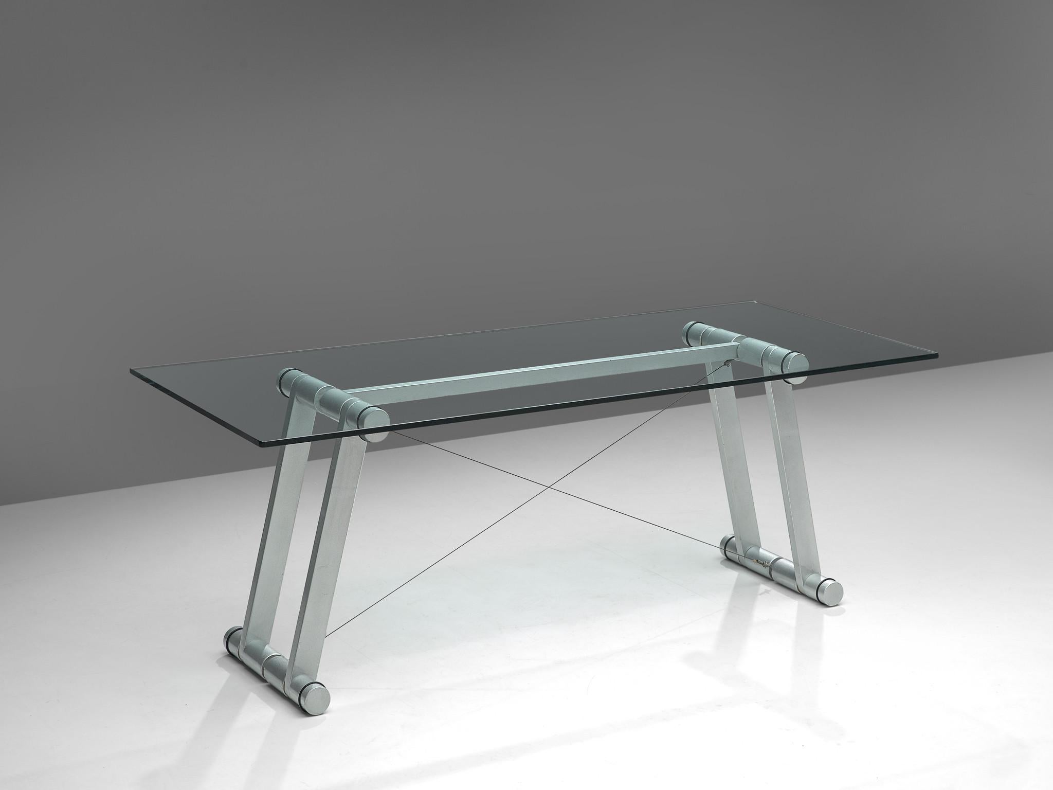 Superstudio, dining table, in metallic lacquered metal and glass, Italy 1970s. 

Exceptional table by the Italian architects of Superstudio. The rectangular work table has a clear glass top. The frame consist of four large tubular legs of metallic