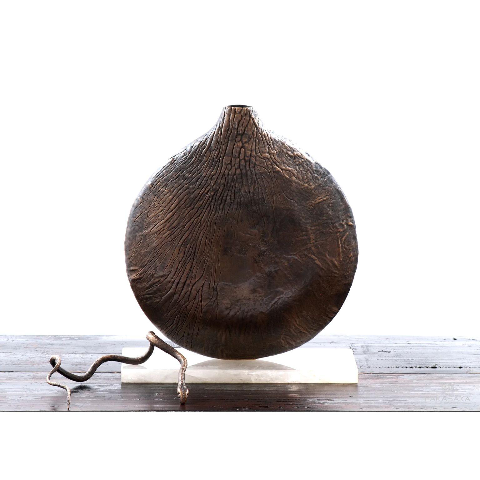 Supert vase by Fakasaka Design
Dimensions: W 35.5 cm D 15cm H 41 cm.
Materials: Dark bronze.

 FAKASAKA is a design company focused on production of high-end furniture, lighting, decorative objects, jewels, and accessories.

Established in