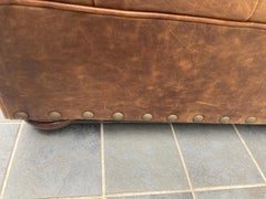 Supple Leather Tufted Club Chair & Ottoman Set