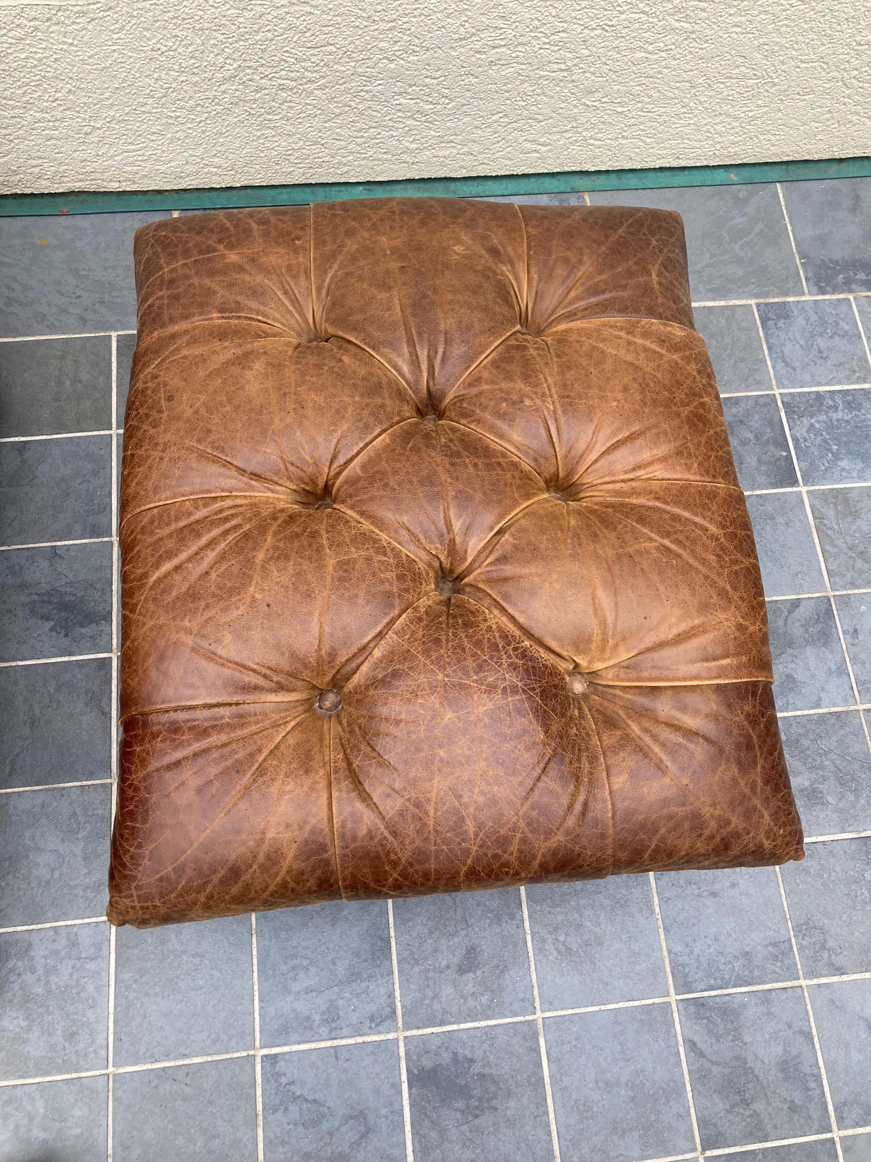 tufted leather chair with ottoman
