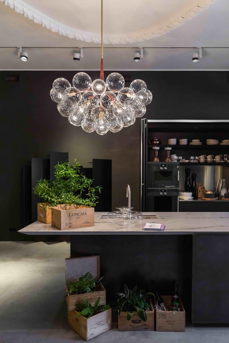 Ethereal and iconic, the Bubble Chandelier is a modern re-interpretation of the crystal chandelier. Its luminous constellation of delicate glass globes adds beauty and depth to any interior environment.

Based on an original design first conceived