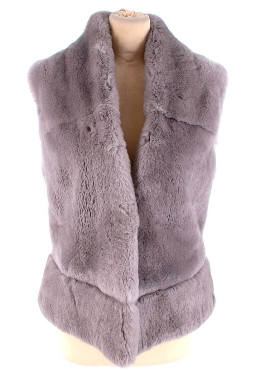 Suprema Grey Rabbit Fur Gilet 

- Luxurious super soft fur texture 
- Classic cut 
- Gorgeous neutral grey hue 
- Concealed hook fastening to the front 
- Fully lined 
- Separate suede belt 
- Timeless elegant design 

Materials:
there is no care