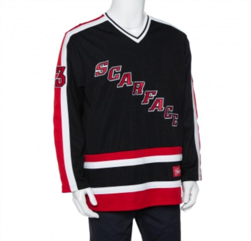 From the Supreme X Scarface collaboration, this hockey jersey is for sports, cinema, and Al Pacino lovers. Made from quality fabric, it is detailed with a paneled design in multiple hues and 'SCARFACE' lettering on the front and 'MONTANA' at the