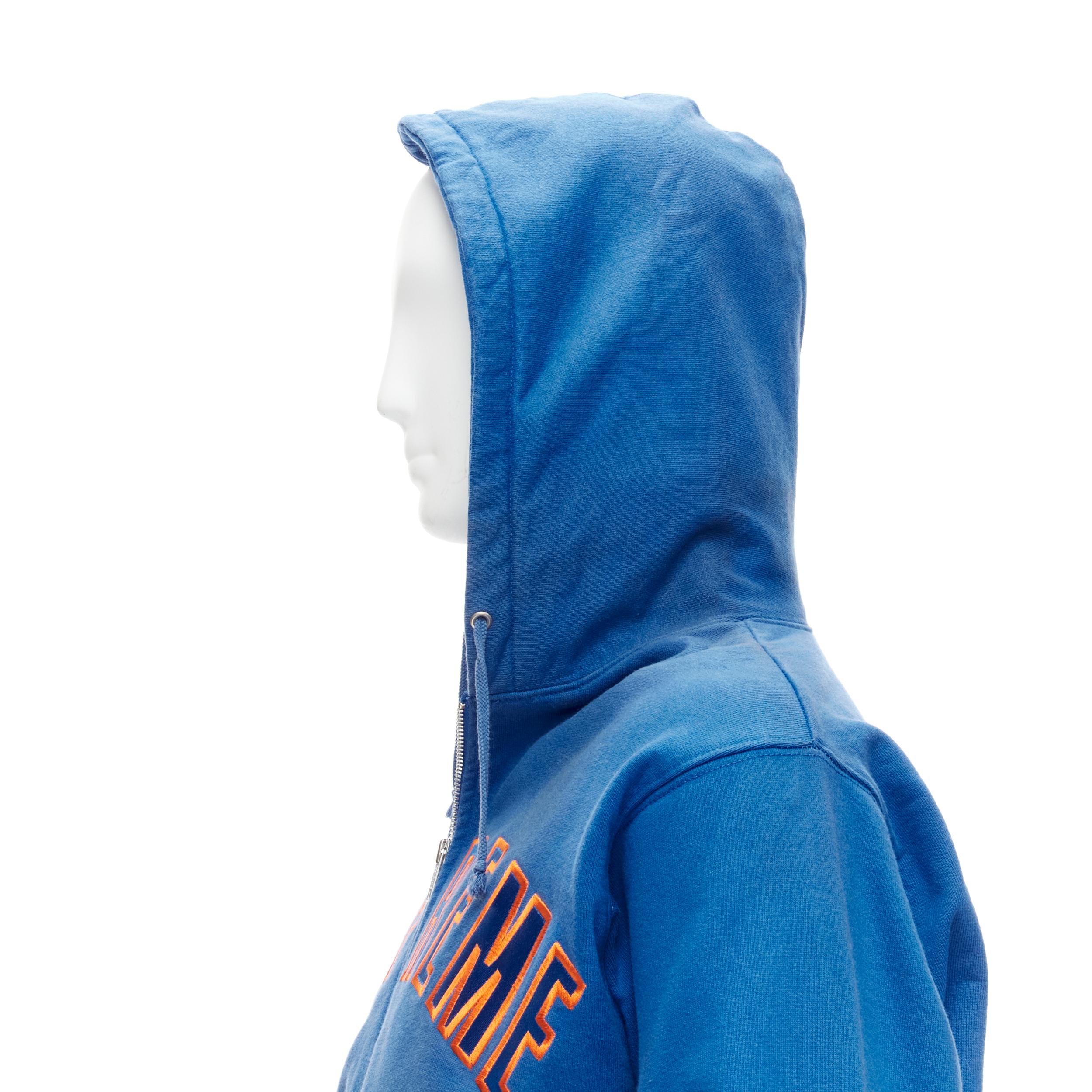 SUPREME blue orange satin embroidery logo zip up hoodie M
Reference: BMPA/A00246
Brand: Supreme
Material: Cotton, Blend
Color: Blue, Orange
Pattern: Solid
Closure: Zip
Made in: Canada

CONDITION:
Condition: Very good, this item was pre-owned and is