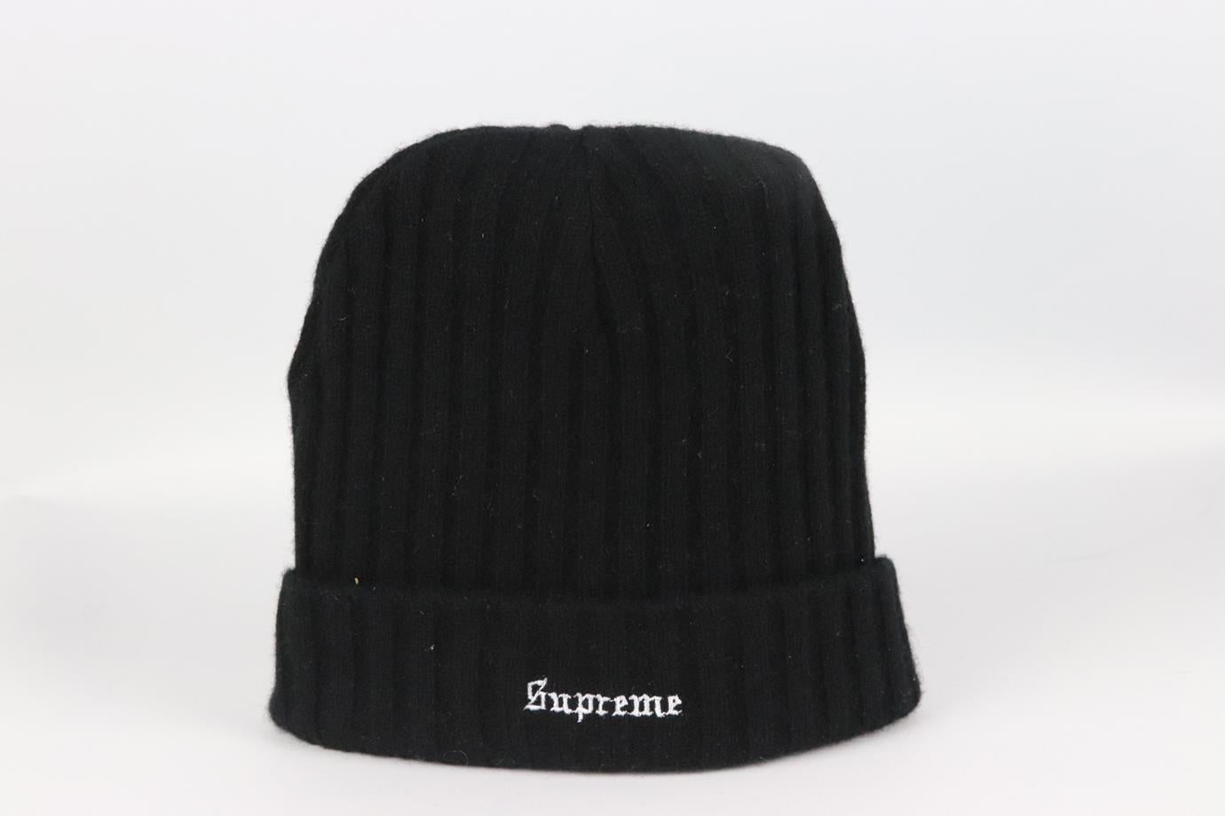 Supreme embroidered ribbed cashmere beanie. Black. Slips on. 100% Cashmere. Does not come with dustbag or box. Size: One Size. Length: 8.25 in. Circumference: 19 in. Very good condition - As new condition, no sign of wear; see pictures.