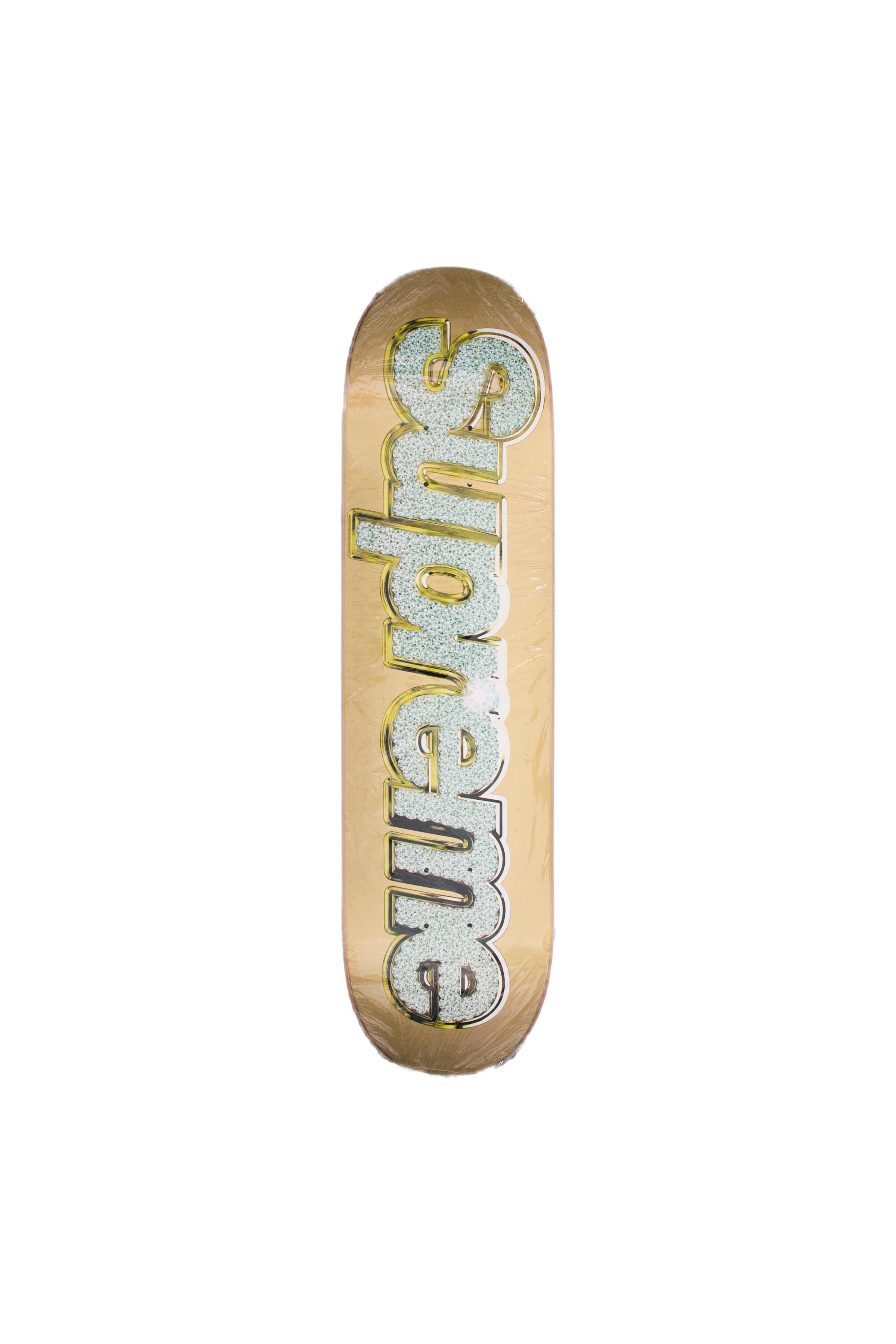 Rare Supreme Bling Gold Skatedeck in Gold. Extremely rare deck, new in packaging.
