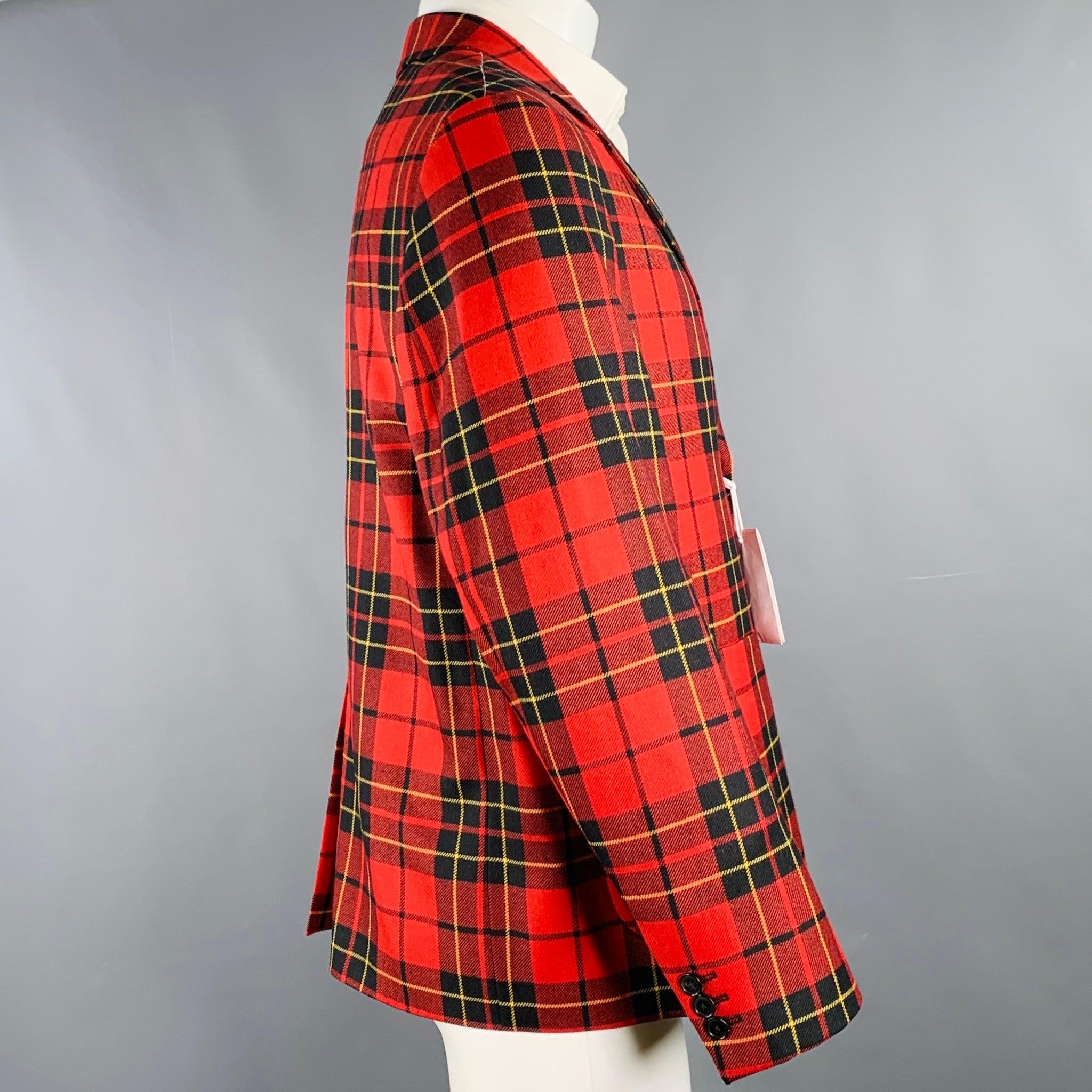 SUPREME sport coat
in a red and black wool featuring a plaid pattern, notch lapel, single vented back, and double button closure. Made in Portugal.New with Tags. 

Marked:   M 

Measurements: 
 
Shoulder: 18 inches Chest: 43 inches Sleeve: 24.5