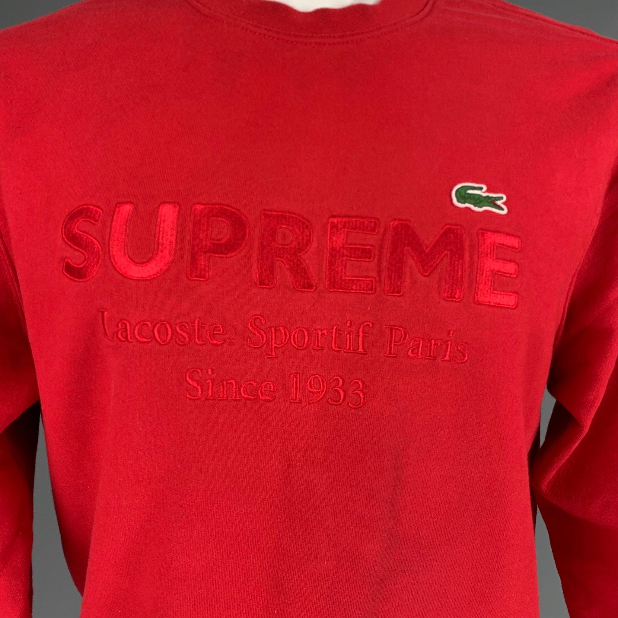 SUPREME x LACOSTE L!VE sweatshirt
in a
red cotton knit featuring alligator logo, embroidered text, and a crew neck.Good Pre-Owned Condition. Moderate mark on back. 

Marked:   S 

Measurements: 
 
Shoulder: 17.5 inches Chest: 44 inches Sleeve: 24