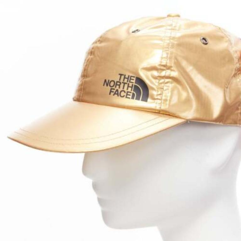 SUPREME The North Face metallic gold black logo 6 panel cap
Reference: BSHW/A00137
Brand: Supreme
Collection: The North Face
Material: Nylon
Color: Gold, Black
Pattern: Solid
Closure: Buckle
Lining: White Fabric
Extra Details: Adjustable at