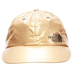 SUPREME The North Face metallic gold black logo 6 panel cap