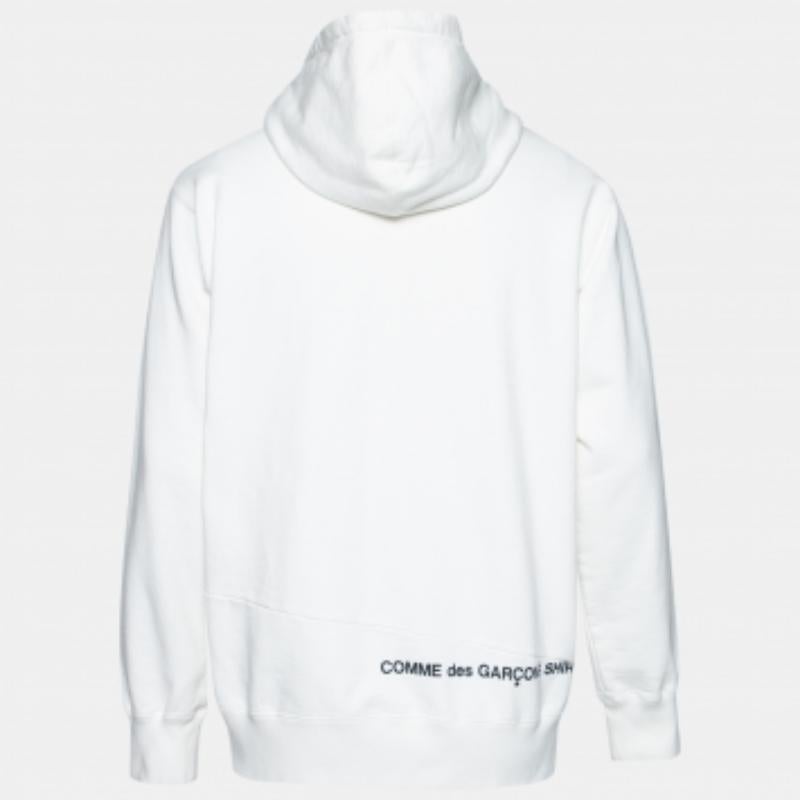 This hoodie from Supreme x Comme des Garçons is great for casual use and will help you stay comfortable. It is made from white terry knit fabric, with split detailed logos elevating its look. It has long sleeves and one pocket. Match this hoodie