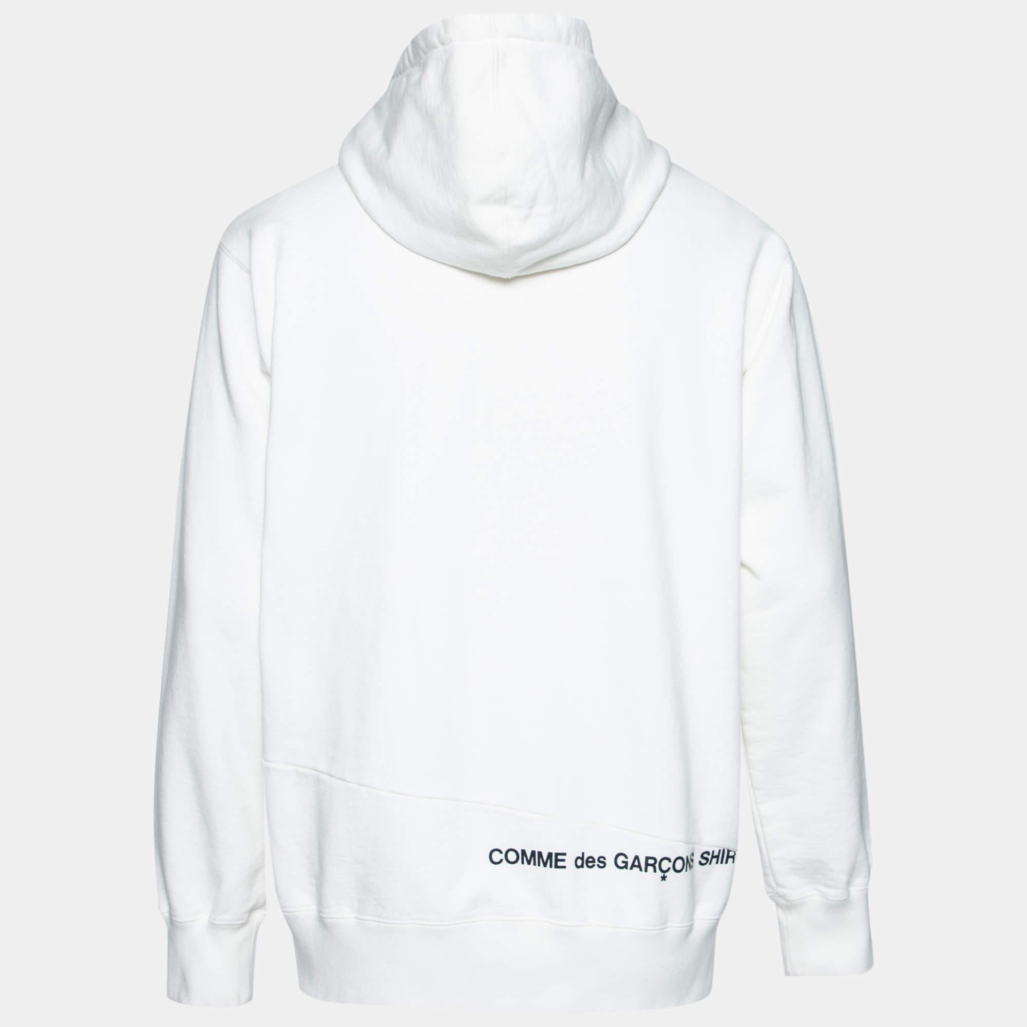 This hoodie from Supreme x Comme des Garçons is great for casual use and will help you stay comfortable. It is made from white terry knit fabric, with split detailed logos elevating its look. It has long sleeves and one pocket. Match this hoodie