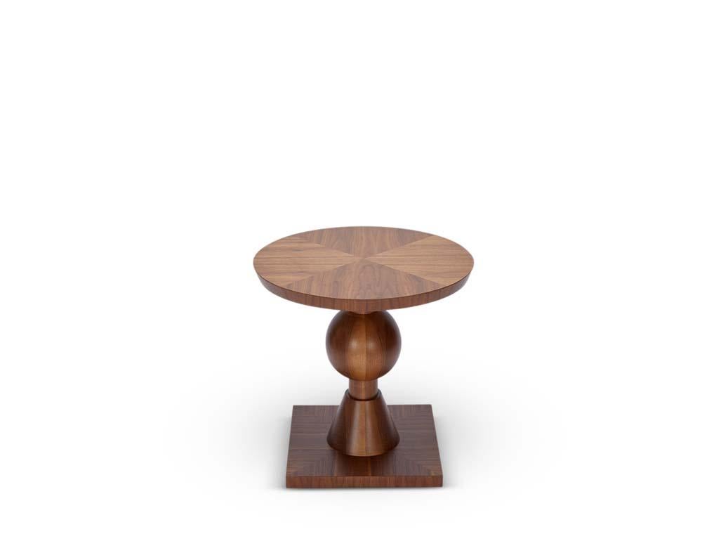 The Sur table features a series of geometric shapes stacked on top of each other with solid wood details. Available in American walnut or white oak. 

The Lawson-Fenning Collection is designed and handmade in Los Angeles, California. Reach out to