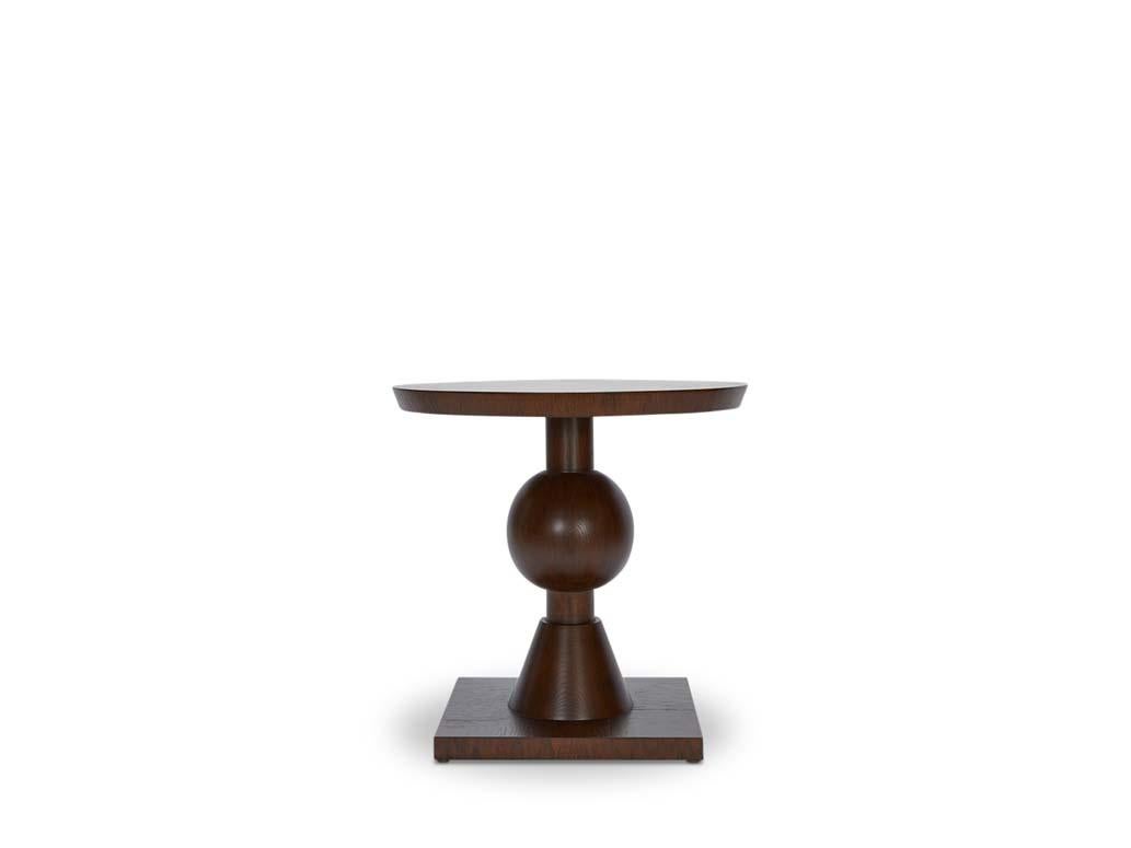 The Sur table features a series of geometric shapes stacked on top of each other with solid wood details. Available in American walnut or white oak. 

The Lawson-Fenning Collection is designed and handmade in Los Angeles, California. Reach out to