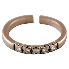 Bague Surel en or blanc 14 carats, ornée de cinq diamants taillés en brillant