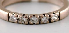Surel Ring in 14 Karat White Gold, Adorned with Five Brilliant-Cut Diamonds