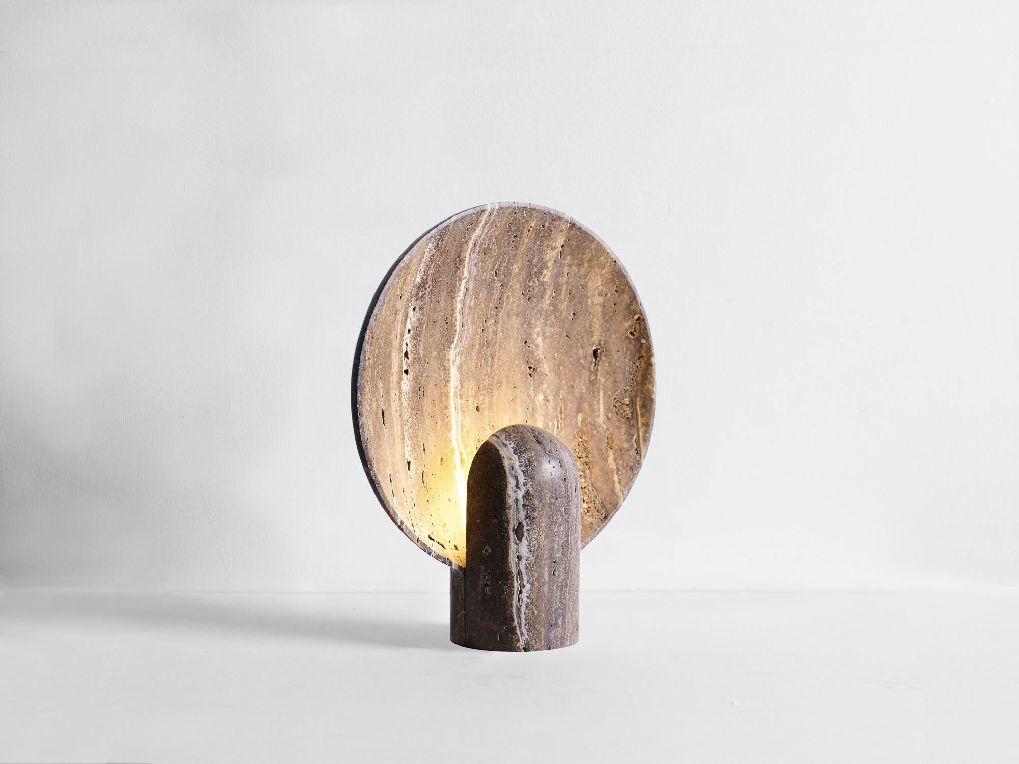 Black Travertine Surface Sconce by Henry Wilson
Dimensions: W 30 x D 11 x H 35 cm
Materials: Black Travertine

This sculptural item is handmade in Sydney, Australia.

The surface sconce in Calacatta marble is an ambient, sculptural light carved in