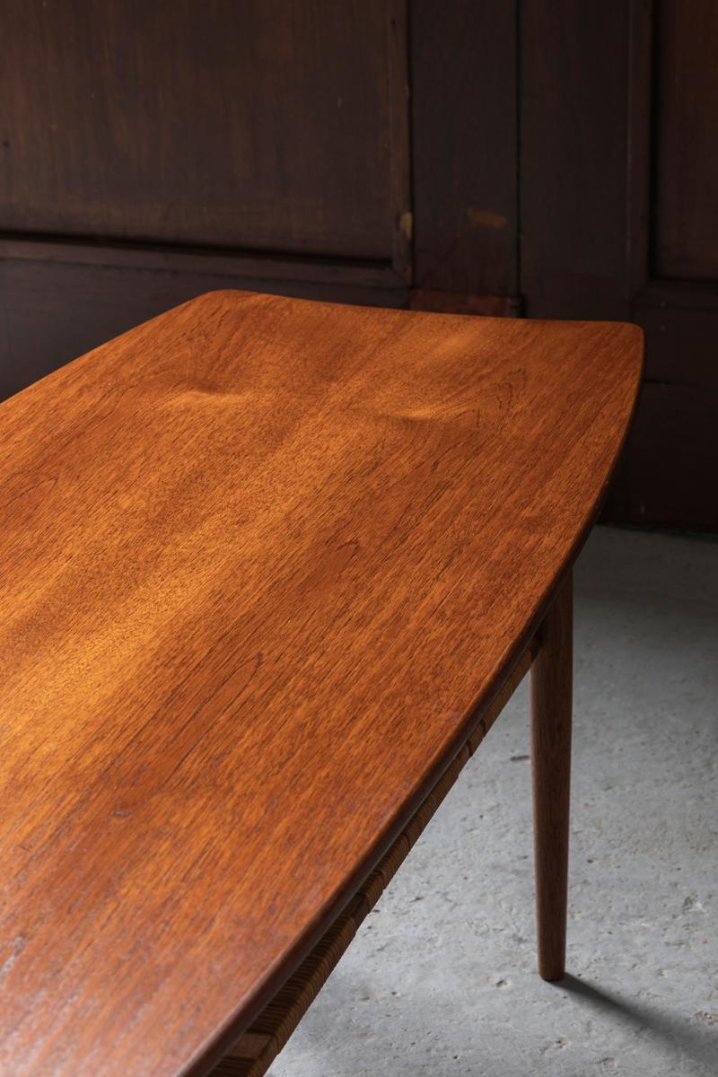 Rattan ‘Surfboard’ Coffee table in Teak wood with Magazine shelf, Dutch design, 1960’s