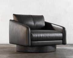 SURGE LOUNGE CHAIR - Modern Design in Faux Lambskin Black