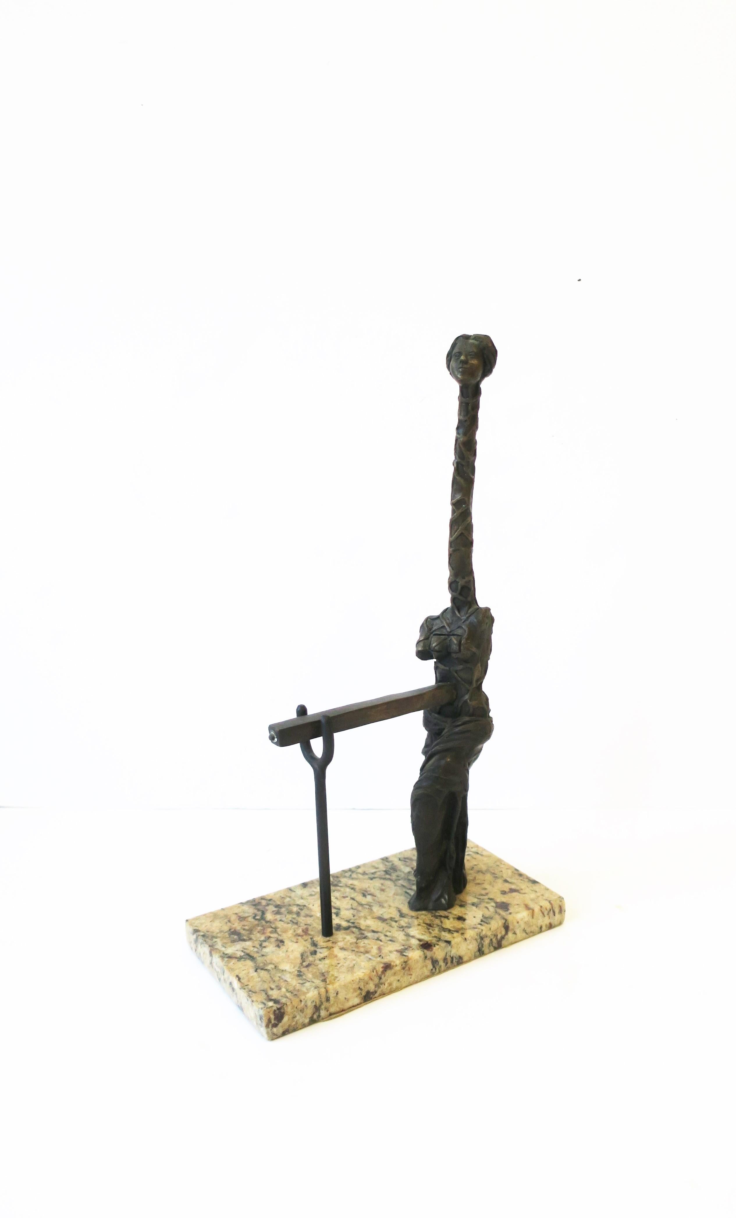 A substantial surrealist bronze female sculpture on marble base, circa 20th century. An interesting sculpture piece, perhaps for a library, office, foyer, etc. Dimensions: 17.88