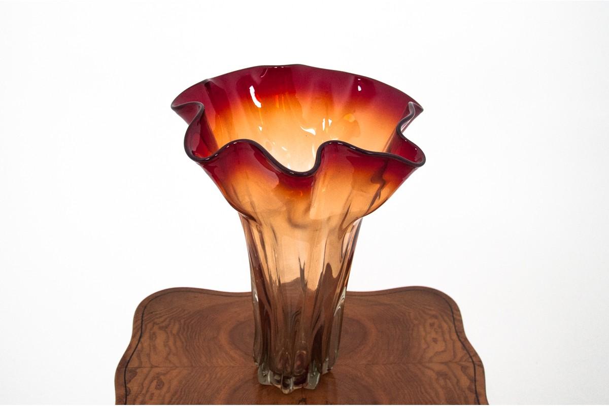 A vase made of glass in the 1960s

Dimensions: height 43 cm, width 34 cm.