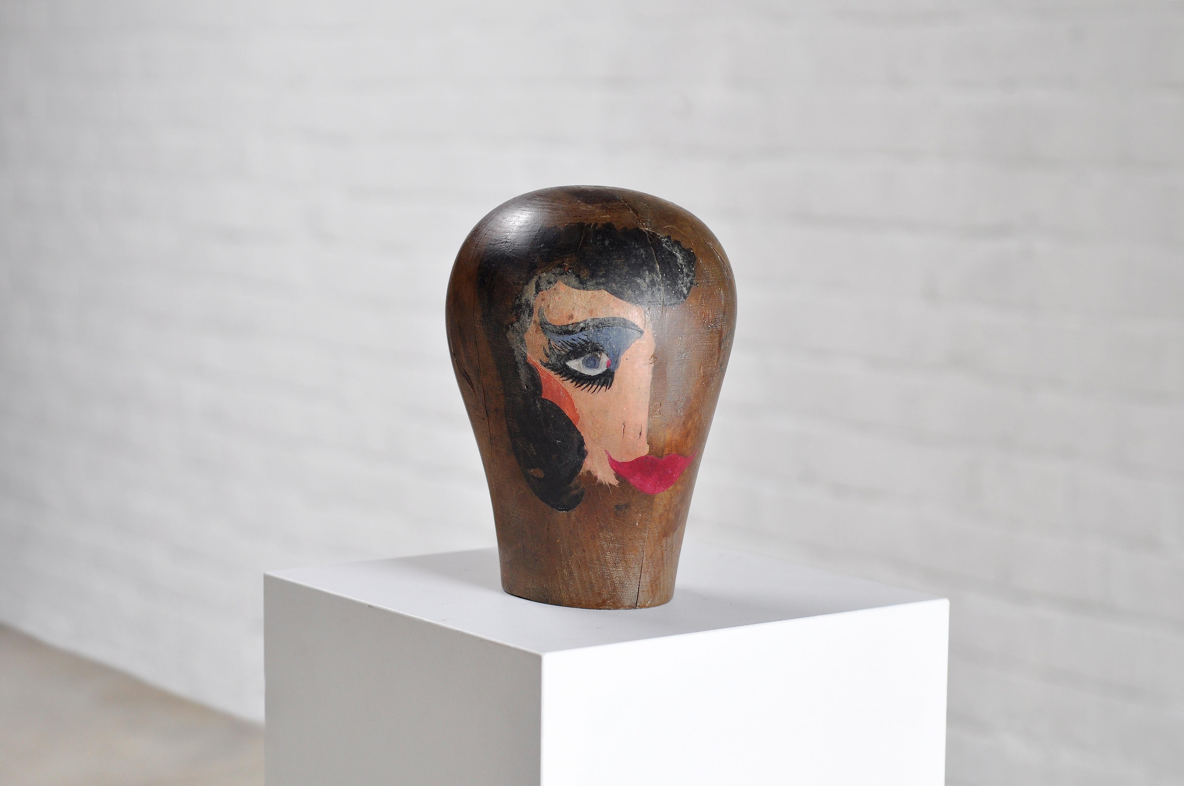 A unique surrealist/abstract bauhaus wooden head sculpture, hand painted circa 1920's. The artist is not known but there is a illegible/unknown stamp on the back bottom. Amazing and very decorative piece of 20th century art. Made out of full wood so