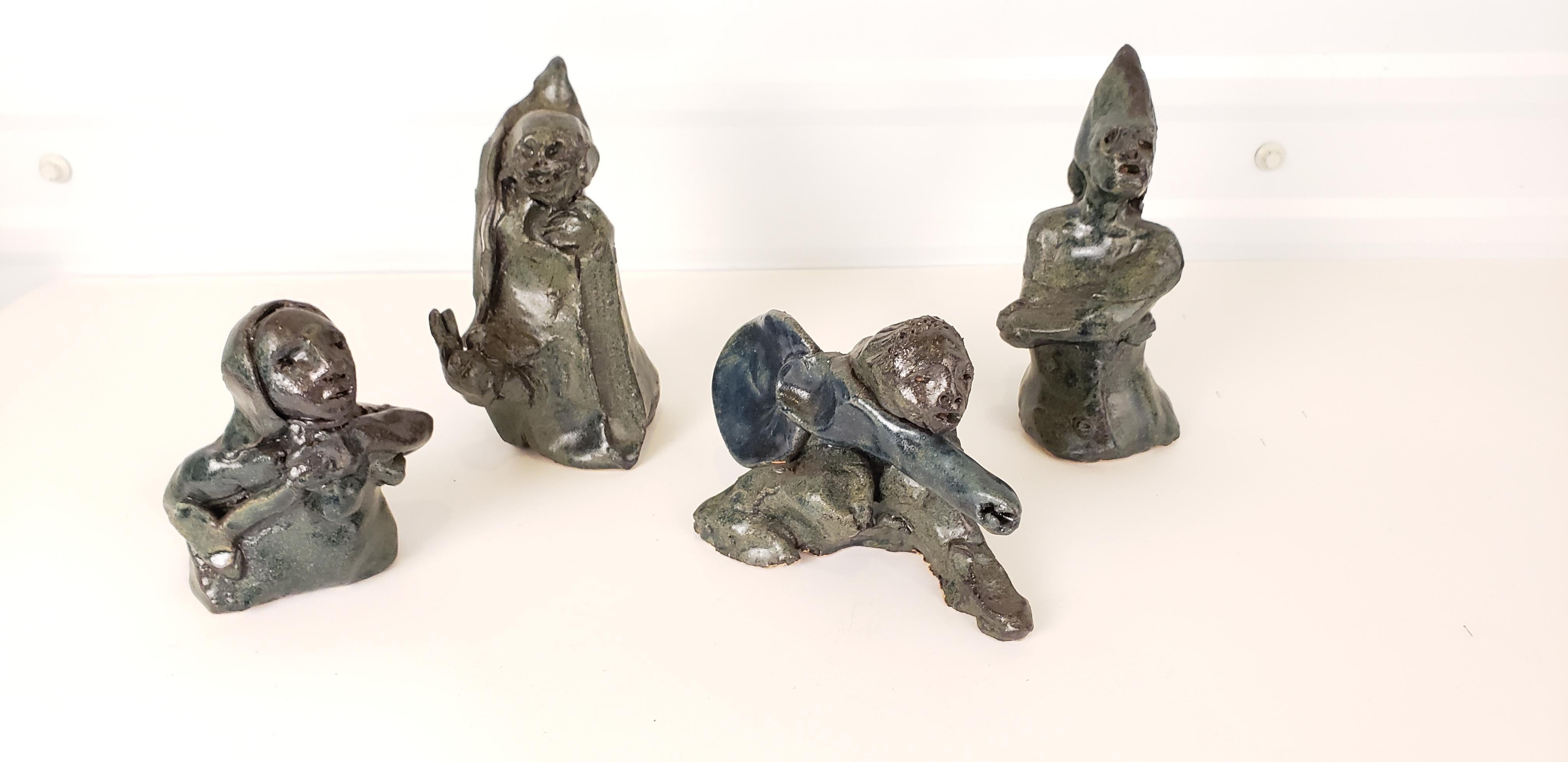 A group of sculptures by Italian American artist Marco Celotti.
Created circa 1970. These highly animated characters can only bring to mind thoughts of storytelling.
Perfect for table top decorating. These figures vary in size.