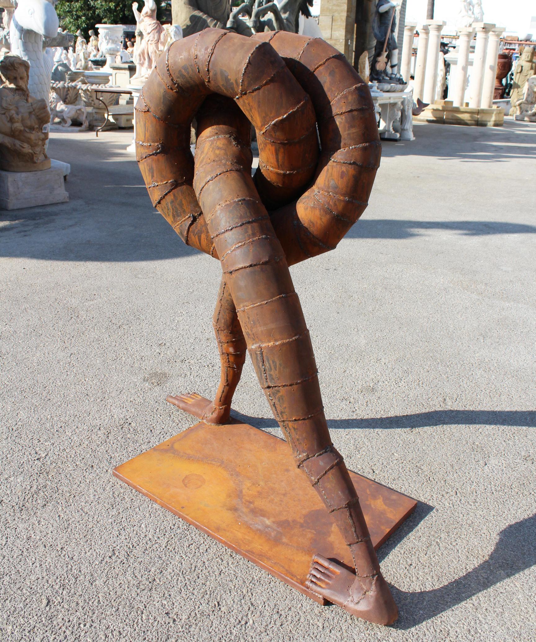 Spanish Surrealist Iron Sculpture Where Intertwined Legs Form the Body