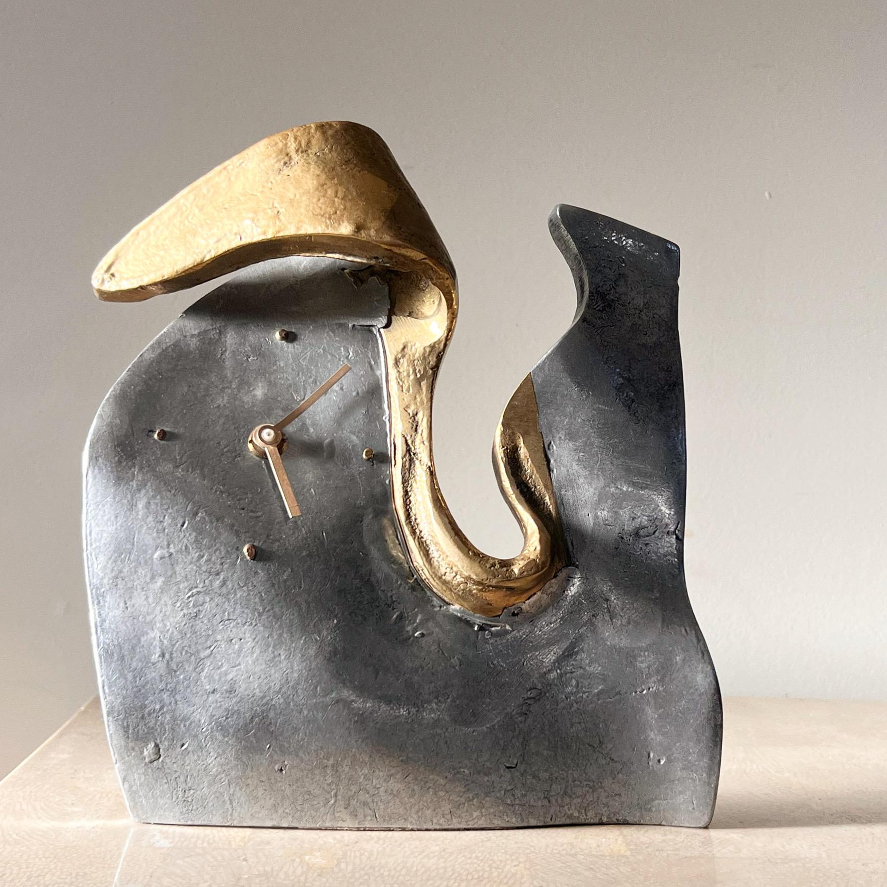 Brutalist Surrealist mixed metal table clock by David Marshall for Art3, Spain circa 1970