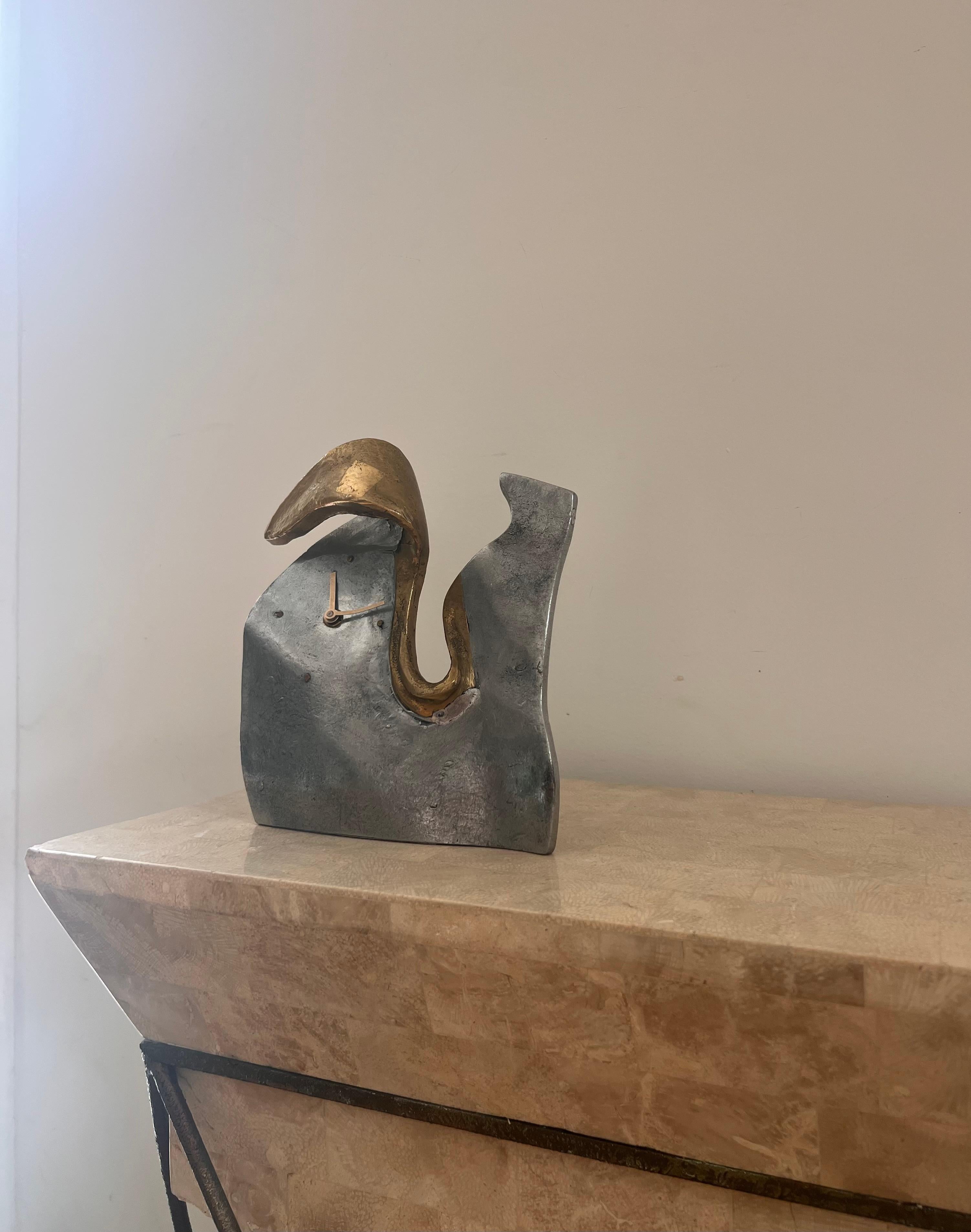 Spanish Surrealist mixed metal table clock by David Marshall for Art3, Spain circa 1970