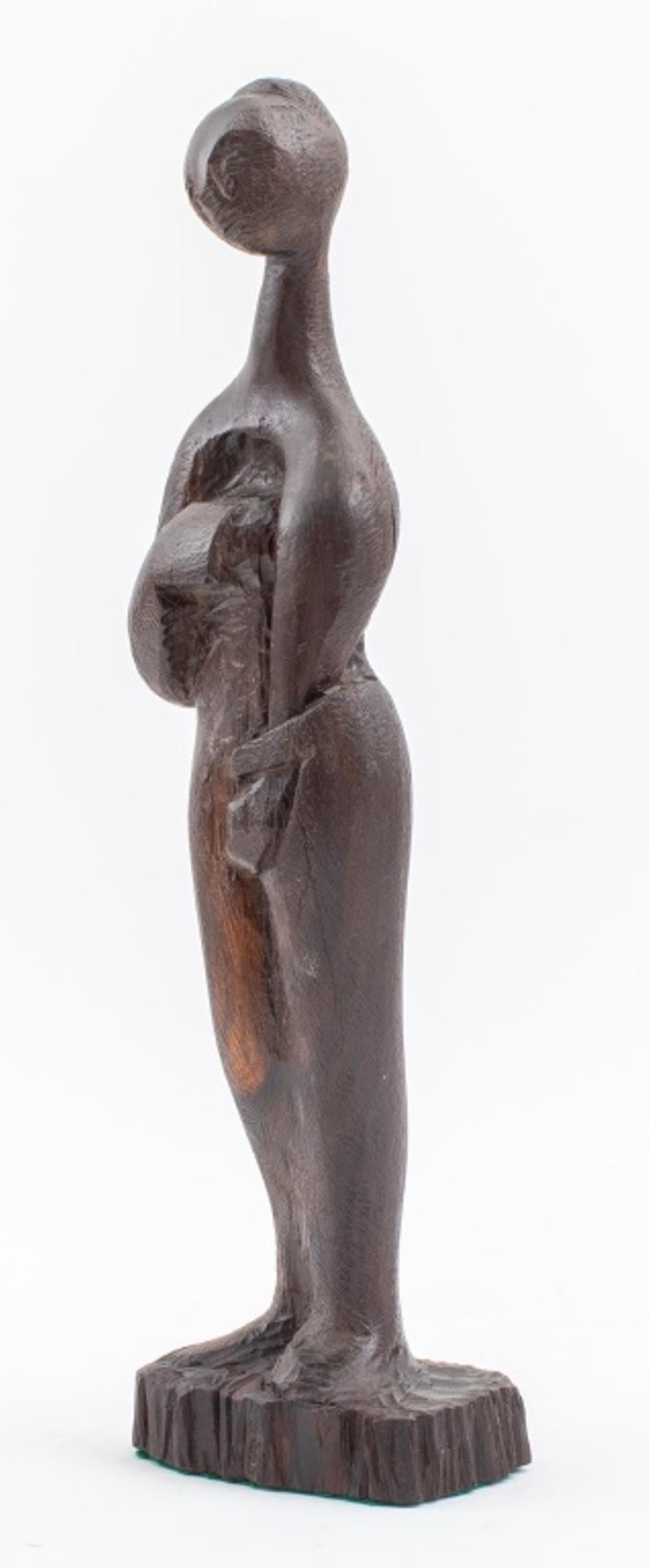 Surrealist carved wood statue sculpture depicting a standing woman in contrapposto pose, first half twentieth century, apparently unsigned. In very good vintage condition.

Dealer: S138XX