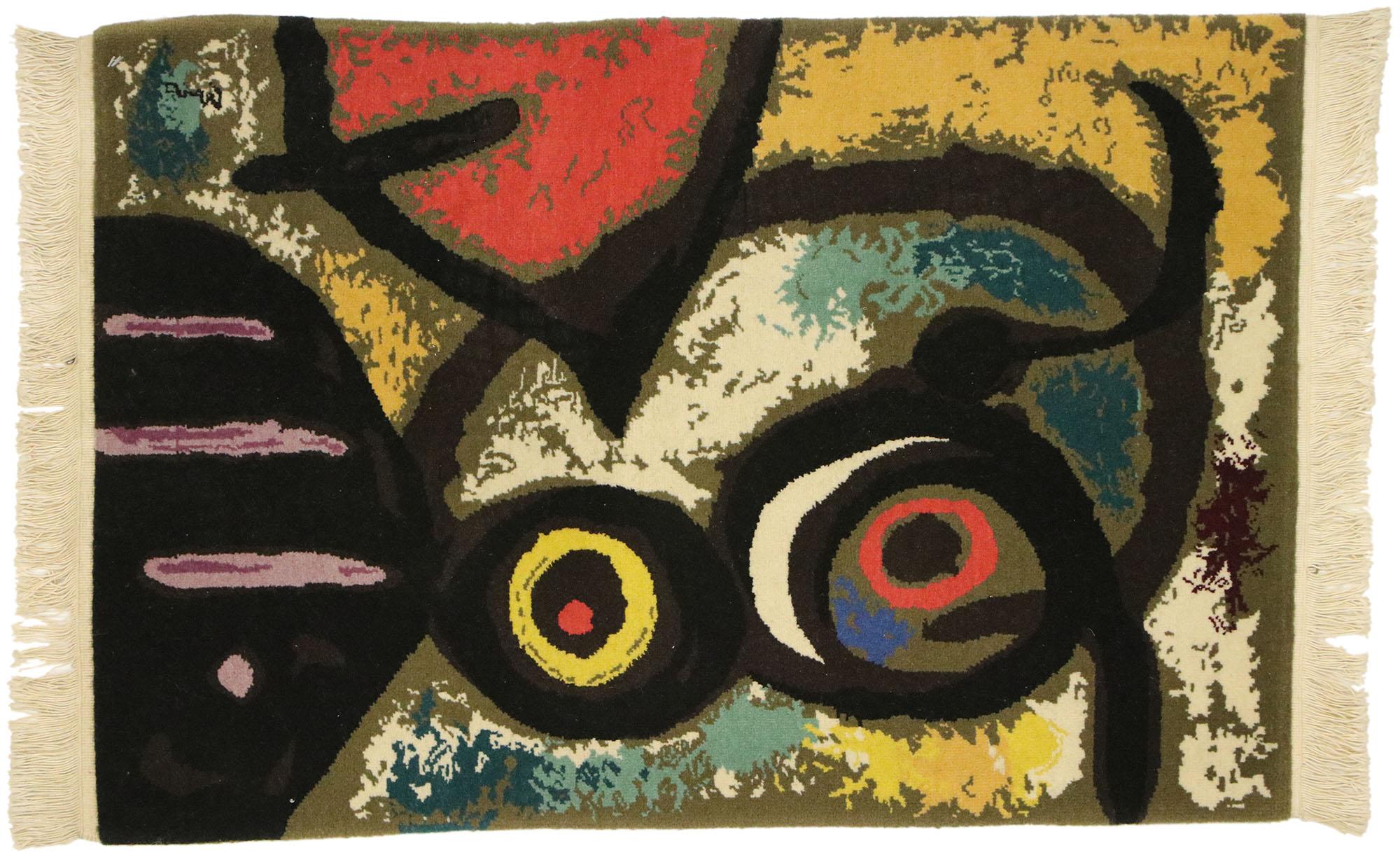 77101, a surrealist style tapestry after Joan Miro's 'Femme et Oiseaux' Woman and Birds, 1966. The painting was the last of a series the artist completed in Barcelona just after the Nazi occupation of France. Miro used his painted to escape from the
