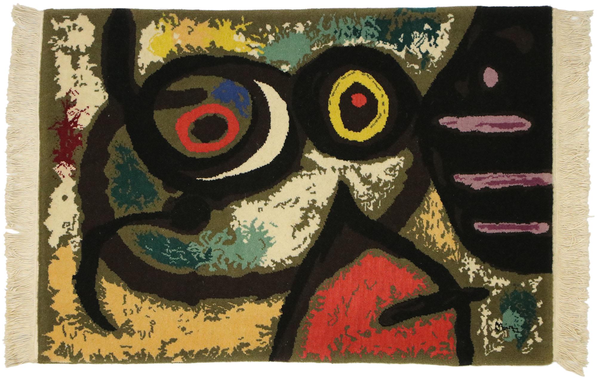 77100 A Surrealist tapestry inspired by Joan Miro's 'Femme et Oiseaux' woman and birds, 1966. The painting was the last of a series the artist completed in Barcelona just after the Nazi occupation of France. Miro used his painted to escape from the