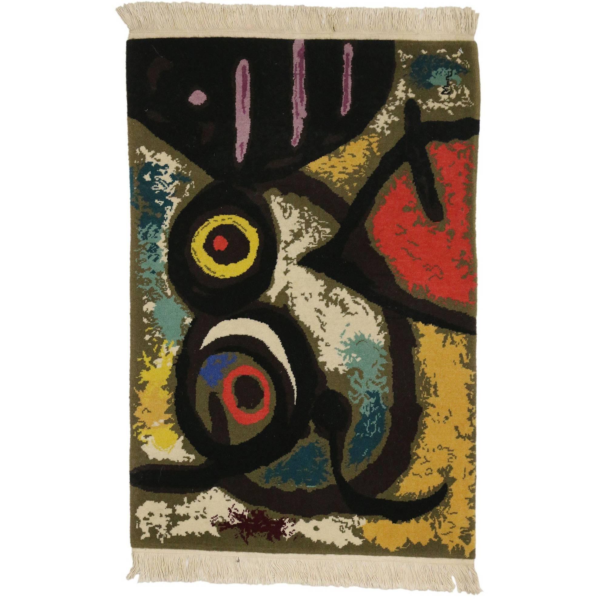 Tapisserie de style surréaliste d'après Femme et Oiseaux de Joan Miro