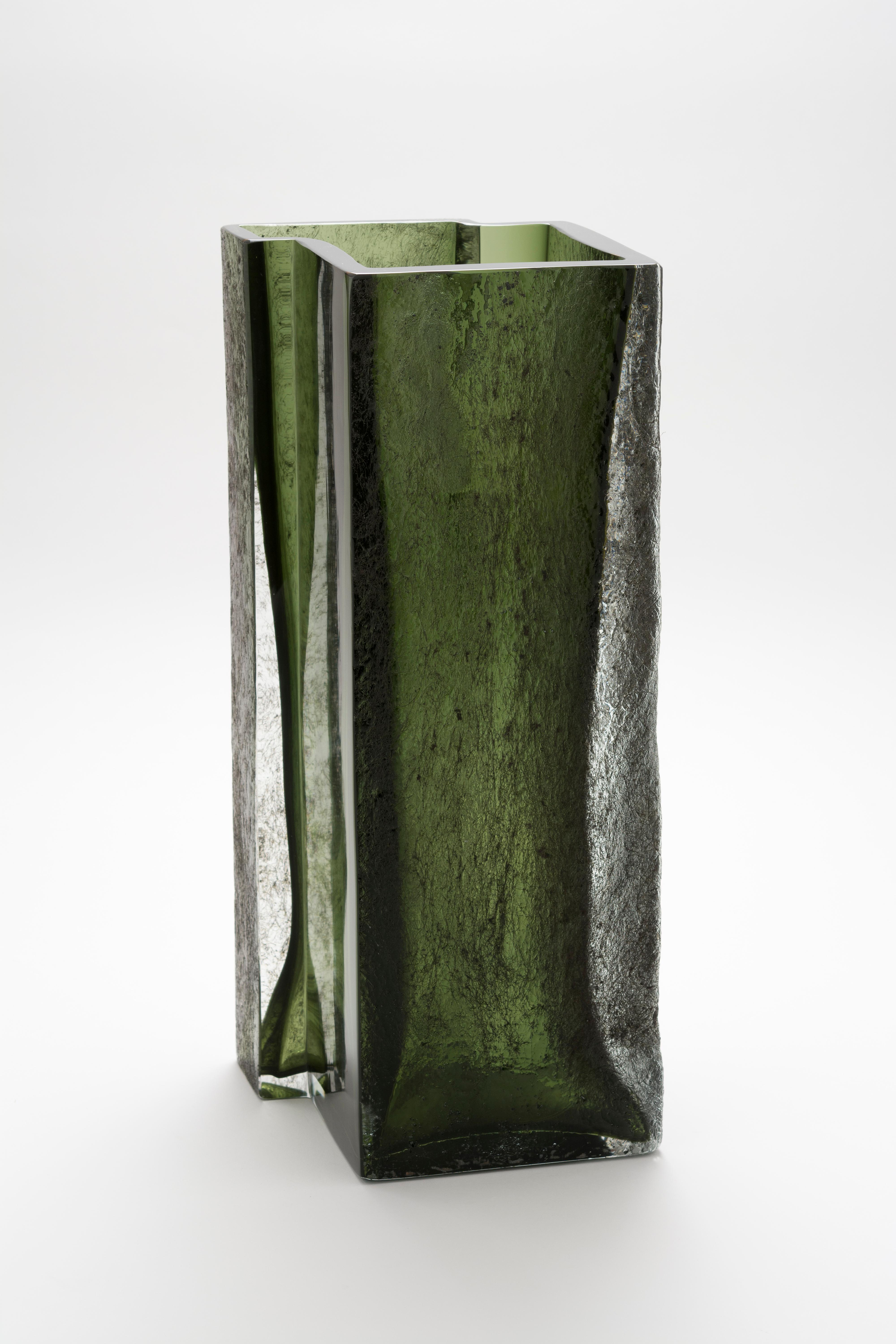 Surrounded by green vase by Paolo Marcolongo
Dimensions: 42.5 x 16.5 x H 16.3 cm 
Materials: Murano Glass and Iron. 


Paolo Marcolongo was born in Padua in 1956, he attended the Art High School 