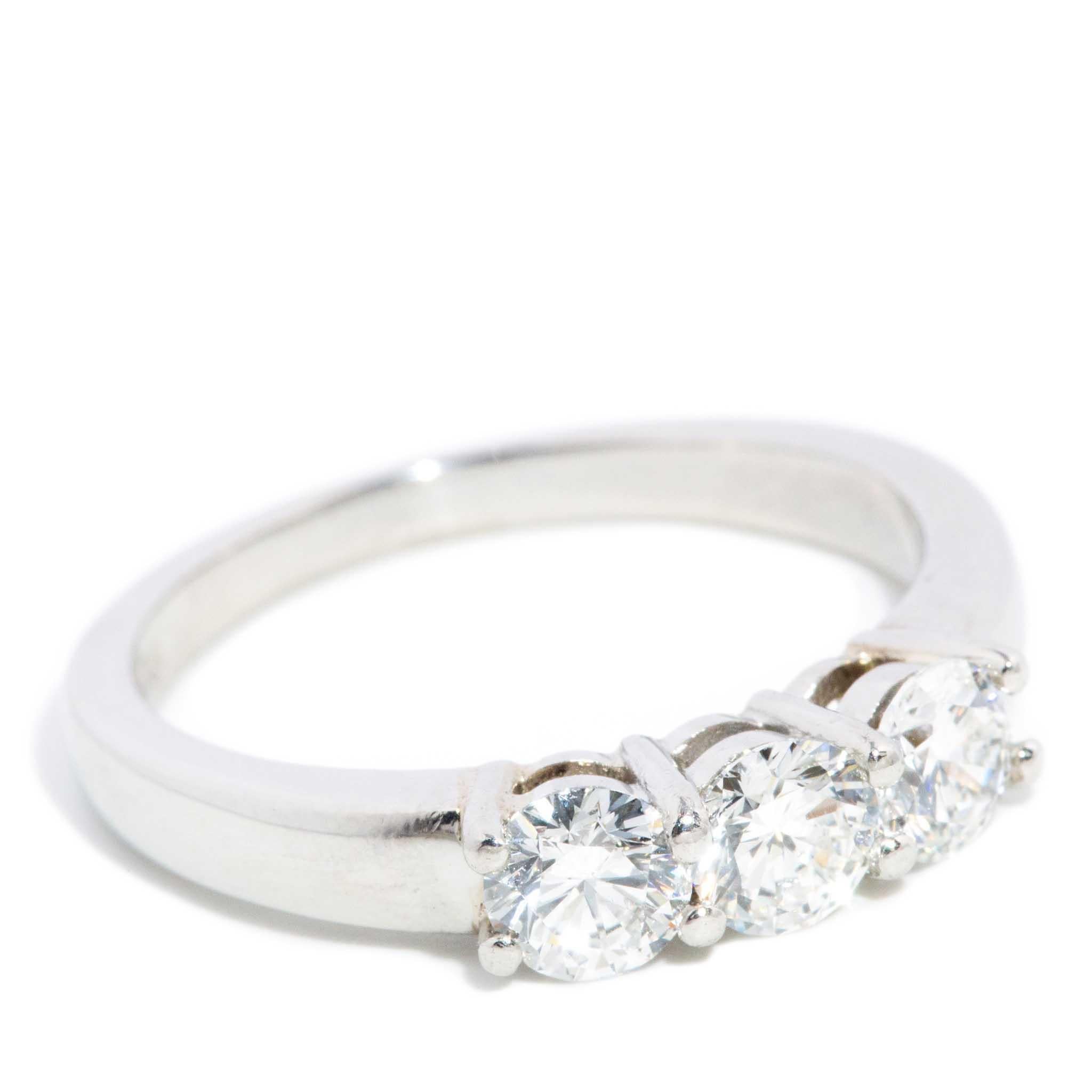 Women's Contemporary Round Brilliant Diamond Platinum Three Stone Ring For Sale