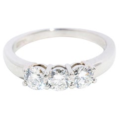 Contemporary Round Brilliant Diamond Platinum Three Stone Ring