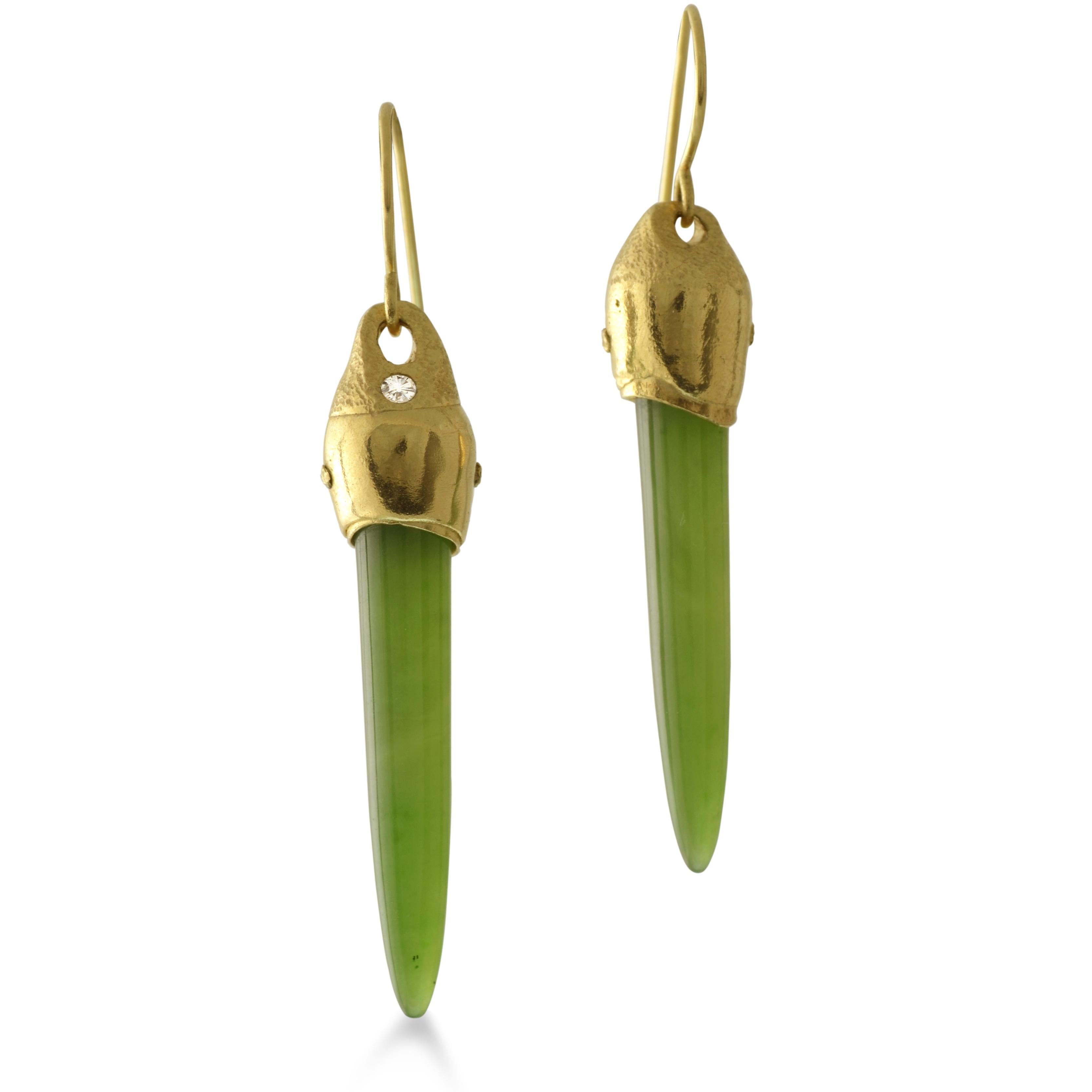 Elongated elegant Nephrites are riveted in our one-of-a-kind 18kt yellow gold earrings. Inspired by textures of bark and composted forest soils. 

Mined and cut in Arizona, these gemmy-green Nephrites are the perfect color to coordinate with what