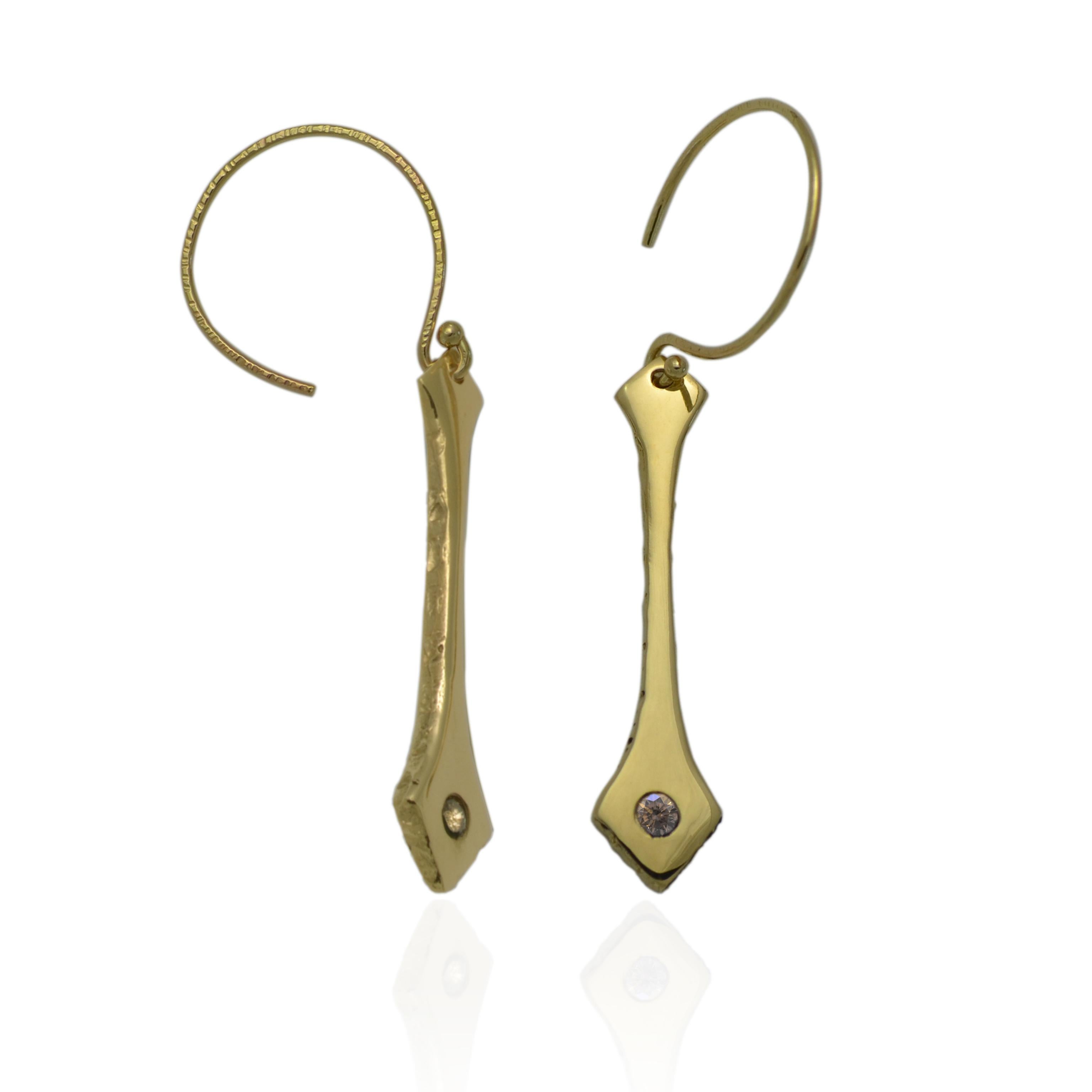 Our Yellow Gold and Champagne Colored Diamond Drop Earrings are inspired by the textures the grass makes when it is blowing on the edge of a beach sand dune fro the wind.

1.5